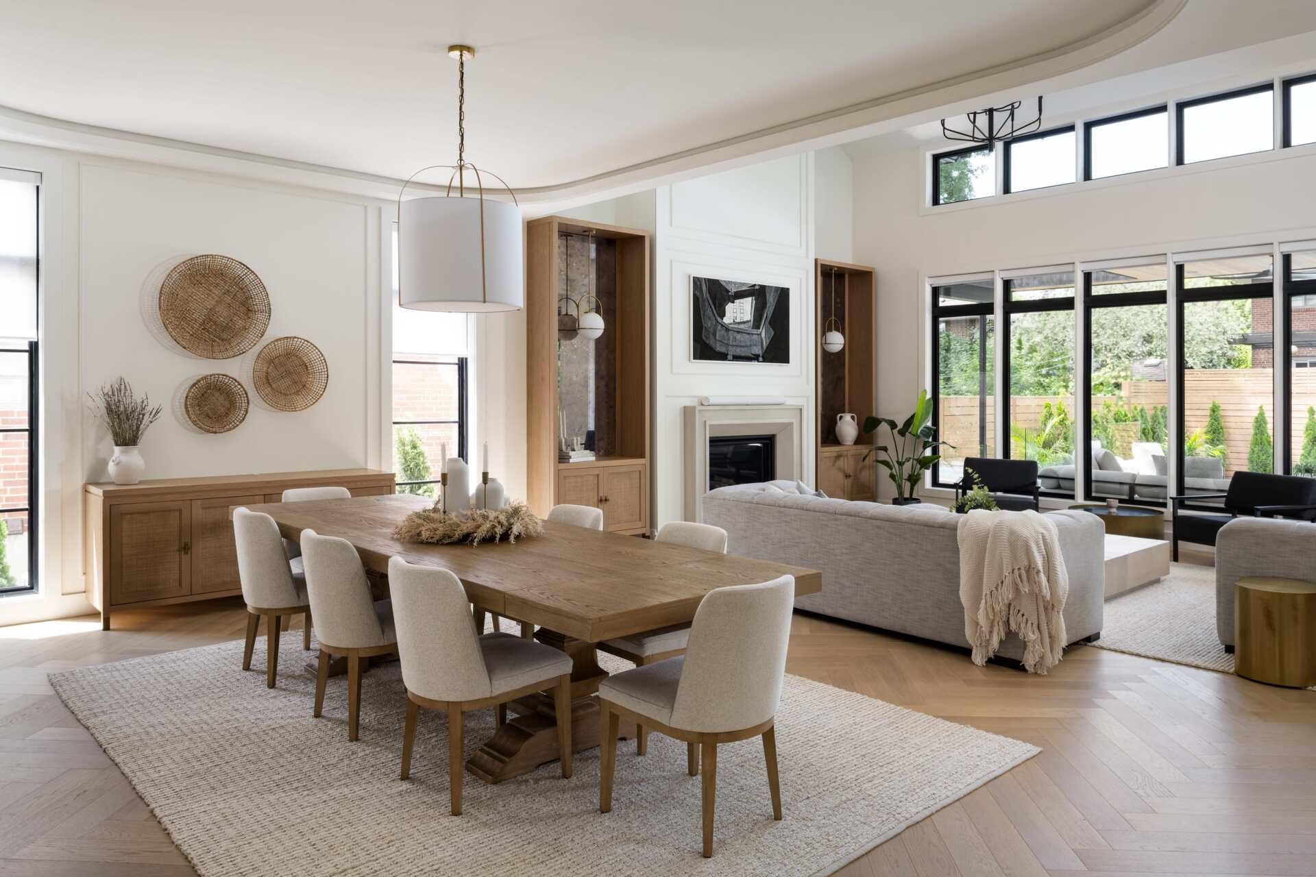 This dining area carries an atmosphere of quiet elegance, designed to complement the living space. Thoughtful proportions and material choices create a refined backdrop for family meals, while integrated wine storage adds a practical yet stylish touch.