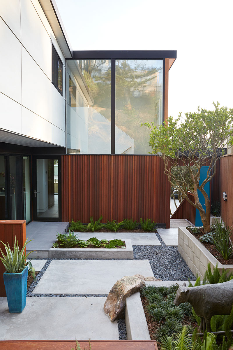 A newly landscaped courtyard creates a tranquil outdoor space that flows effortlessly into the home’s interior.