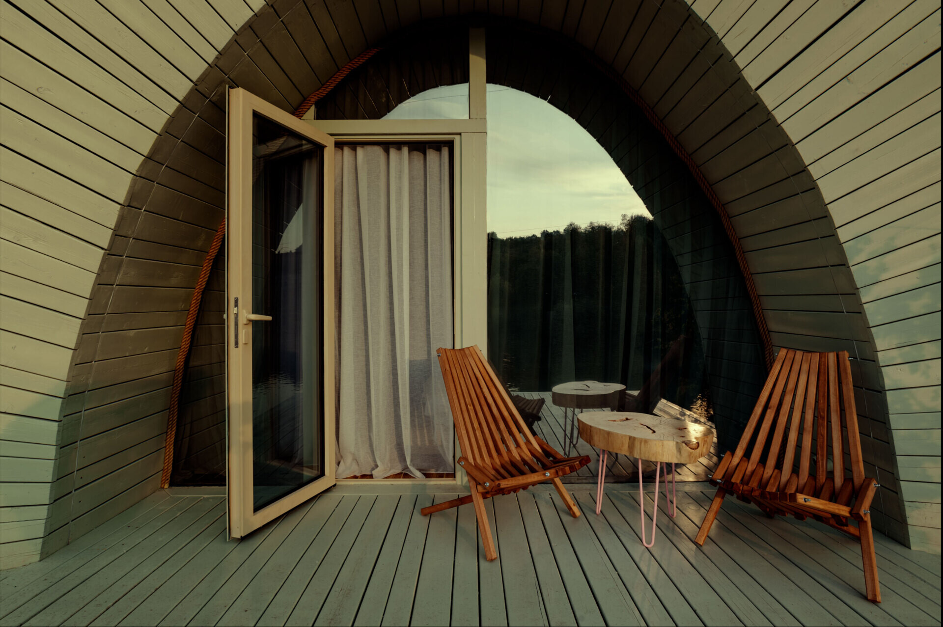 A hobbit-inspired cabin built-into the earth, includes a bedroom, kitchen, and bathroom.