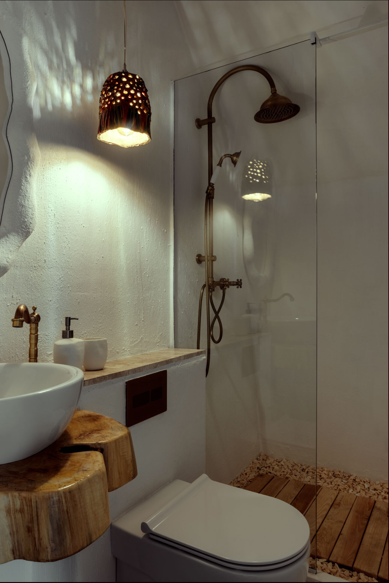 A hobbit-inspired cabin built-into the earth, includes a bedroom, kitchen, and bathroom.