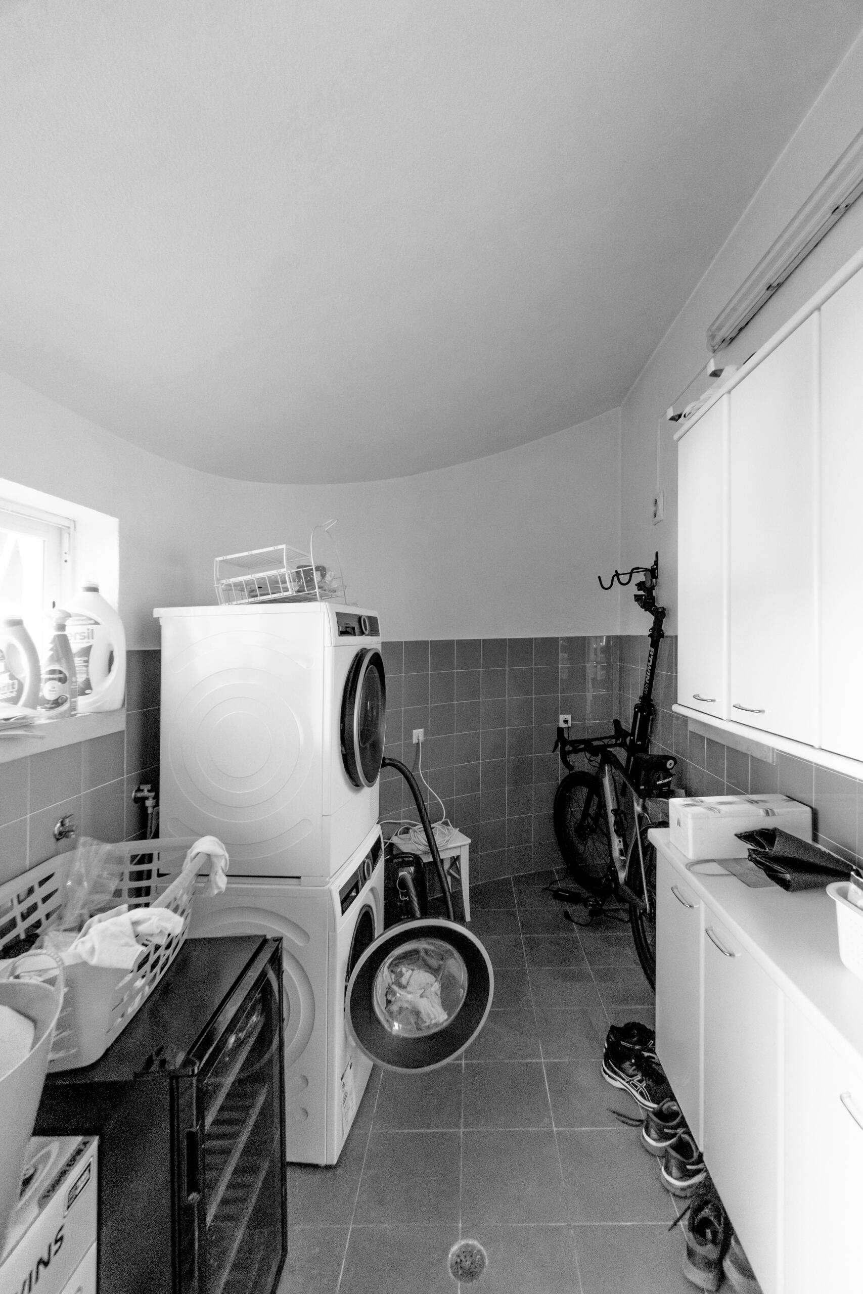 BEFORE - The laundry was once a utilitarian afterthought, disconnected and lacking light, it didn’t reflect the thoughtful architecture of the rest of the home.