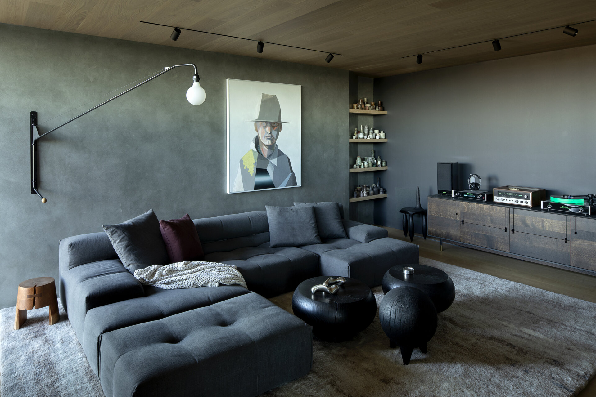 A dedicated media lounge occupies its own space, allowing for entertainment without interrupting the flow of daily life.