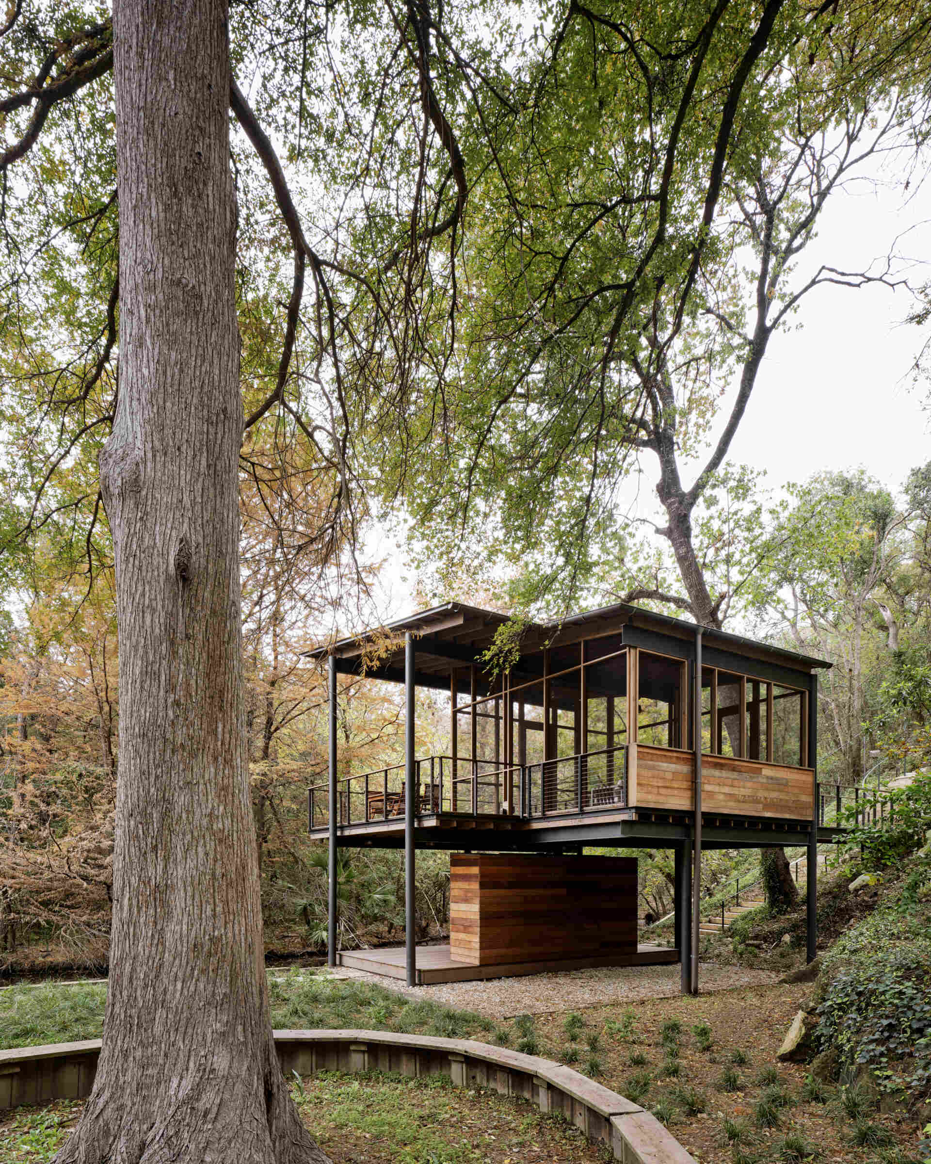A modern structure designed for bird-watching and canoe/kayak storage, also provides access to the water.