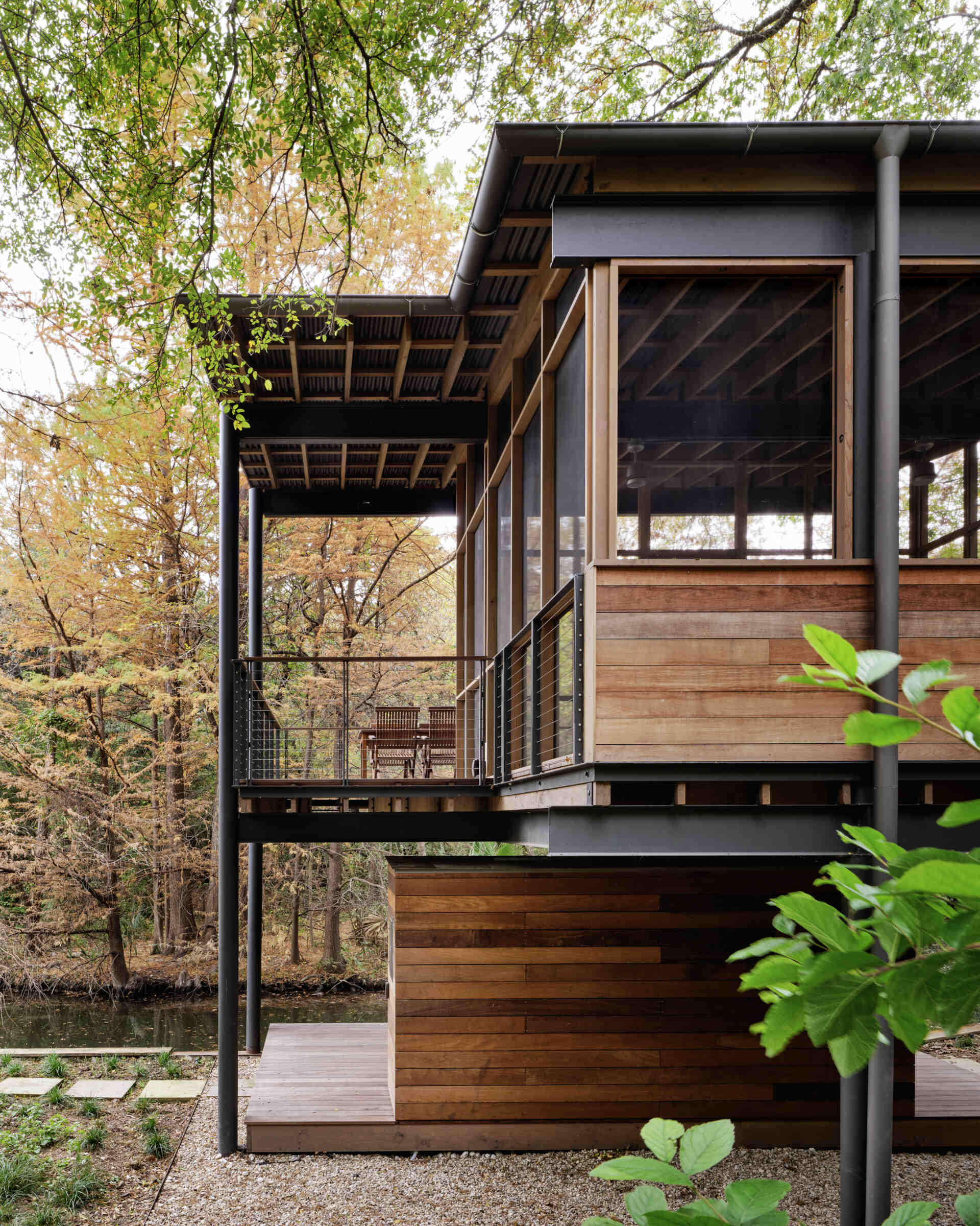 A modern structure designed for bird-watching and canoe/kayak storage, also provides access to the water.