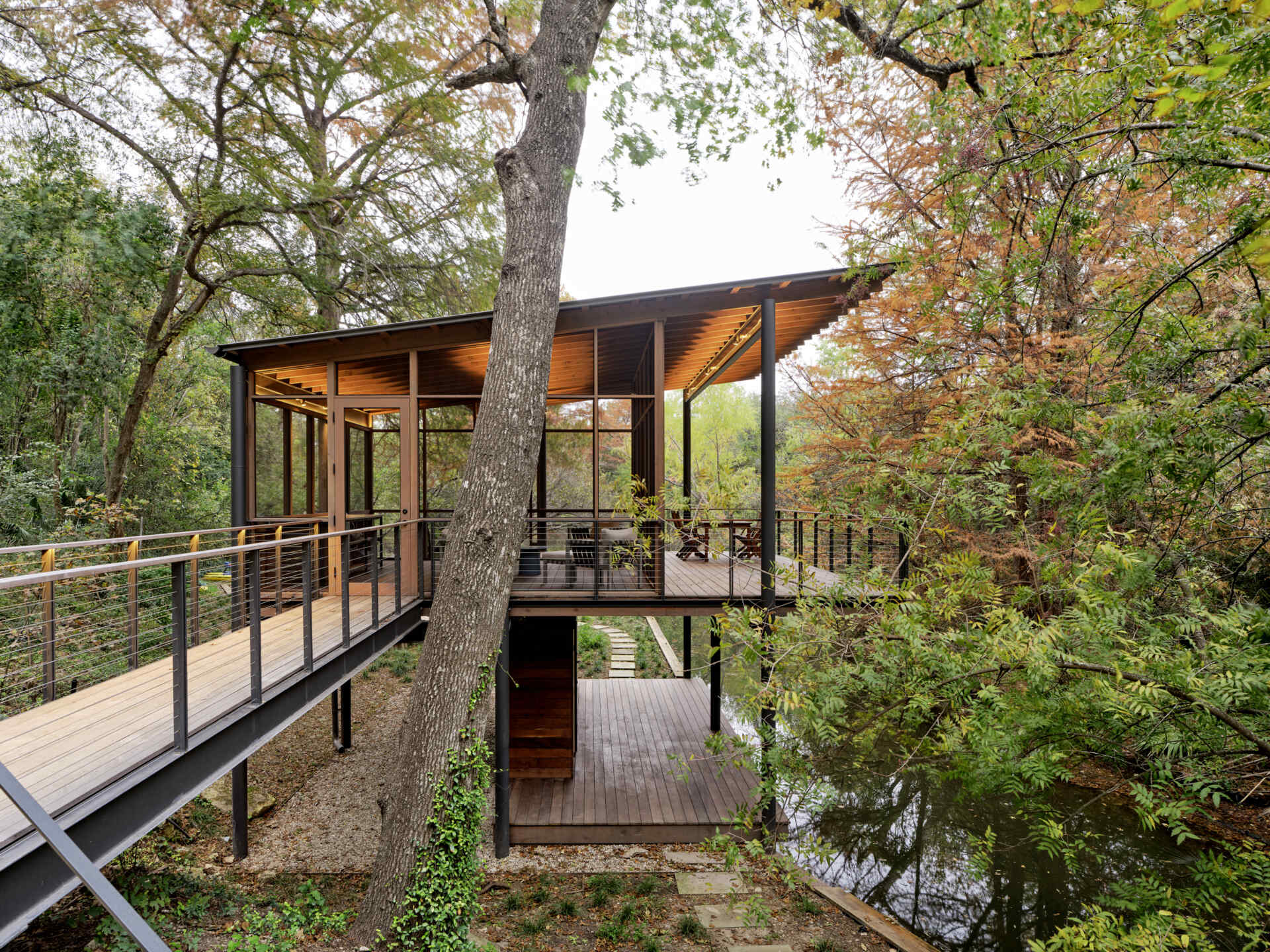 A modern structure designed for bird-watching and canoe/kayak storage, also provides access to the water.