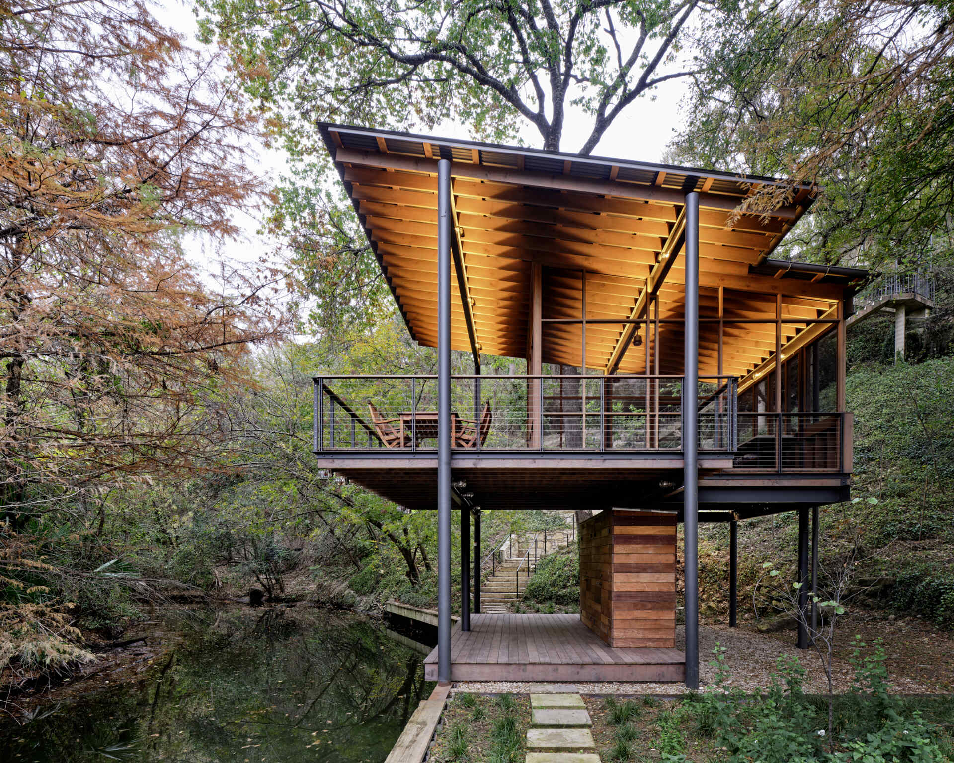 A modern structure designed for bird-watching and canoe/kayak storage, also provides access to the water.
