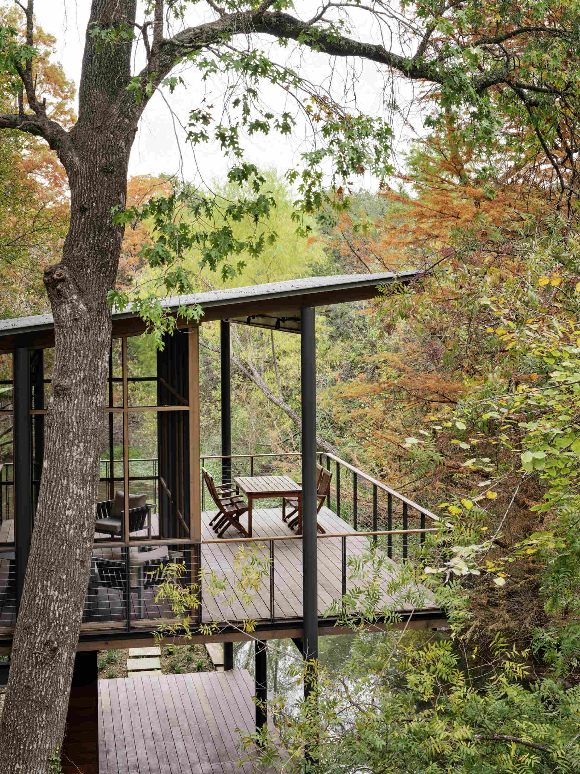 A modern structure designed for bird-watching and canoe/kayak storage, also provides access to the water.