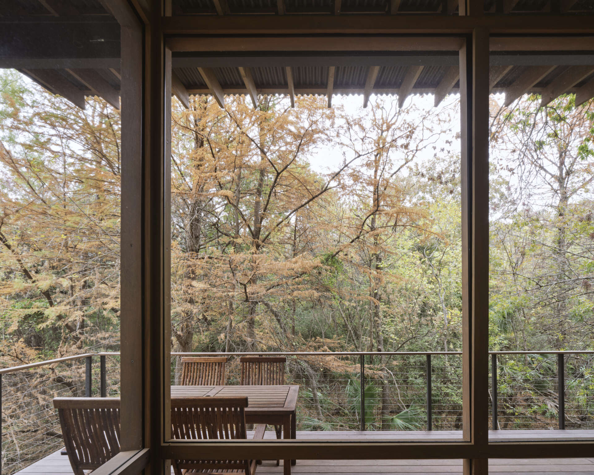 A modern structure designed for bird-watching and canoe/kayak storage, also provides access to the water.