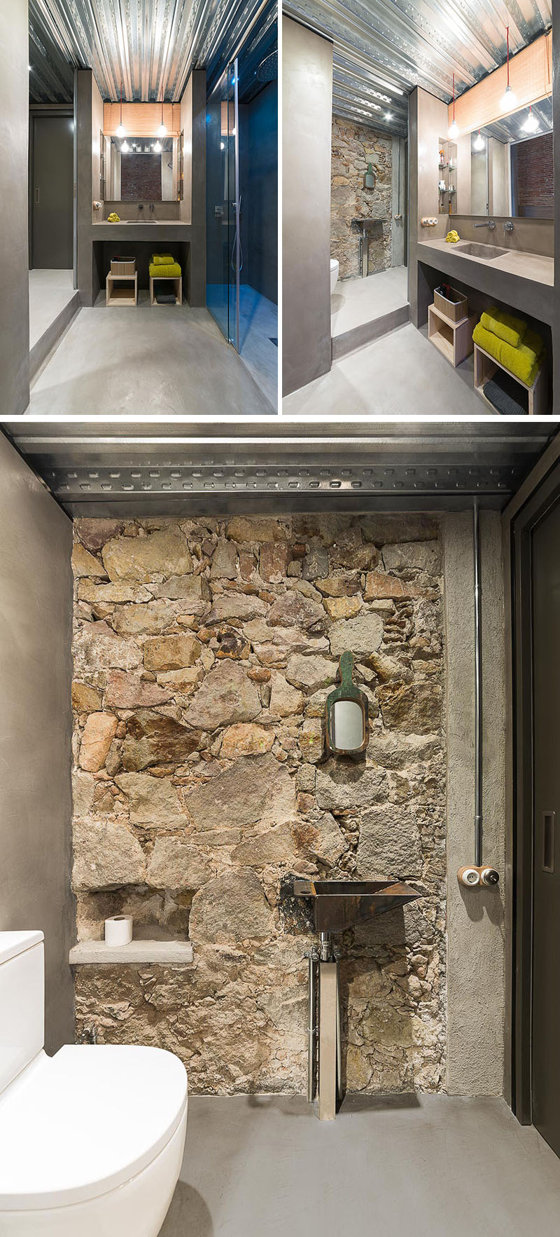 A layered bathroom design with stepped levels, a bright metal ceiling, and an original stone feature wall.