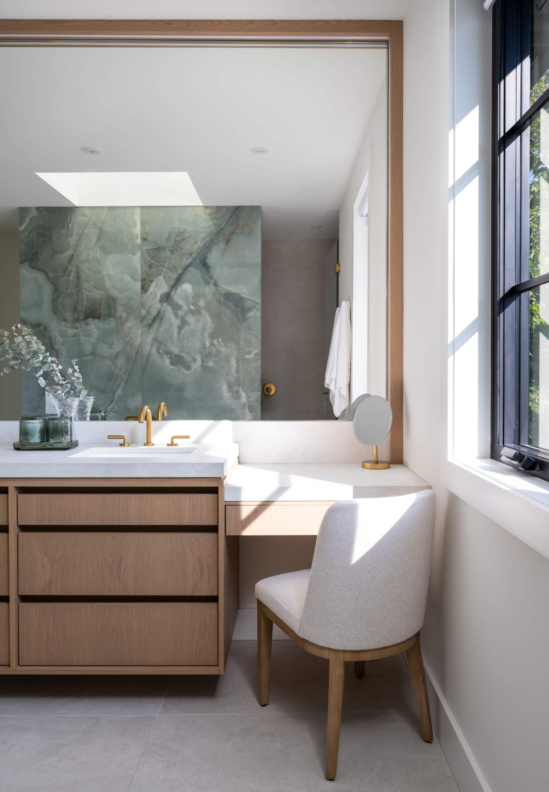 In keeping with the home’s design ethos, the bathrooms emphasize simplicity. Clean lines, matte finishes, and a natural palette make them extensions of the calm atmosphere that defines every room.