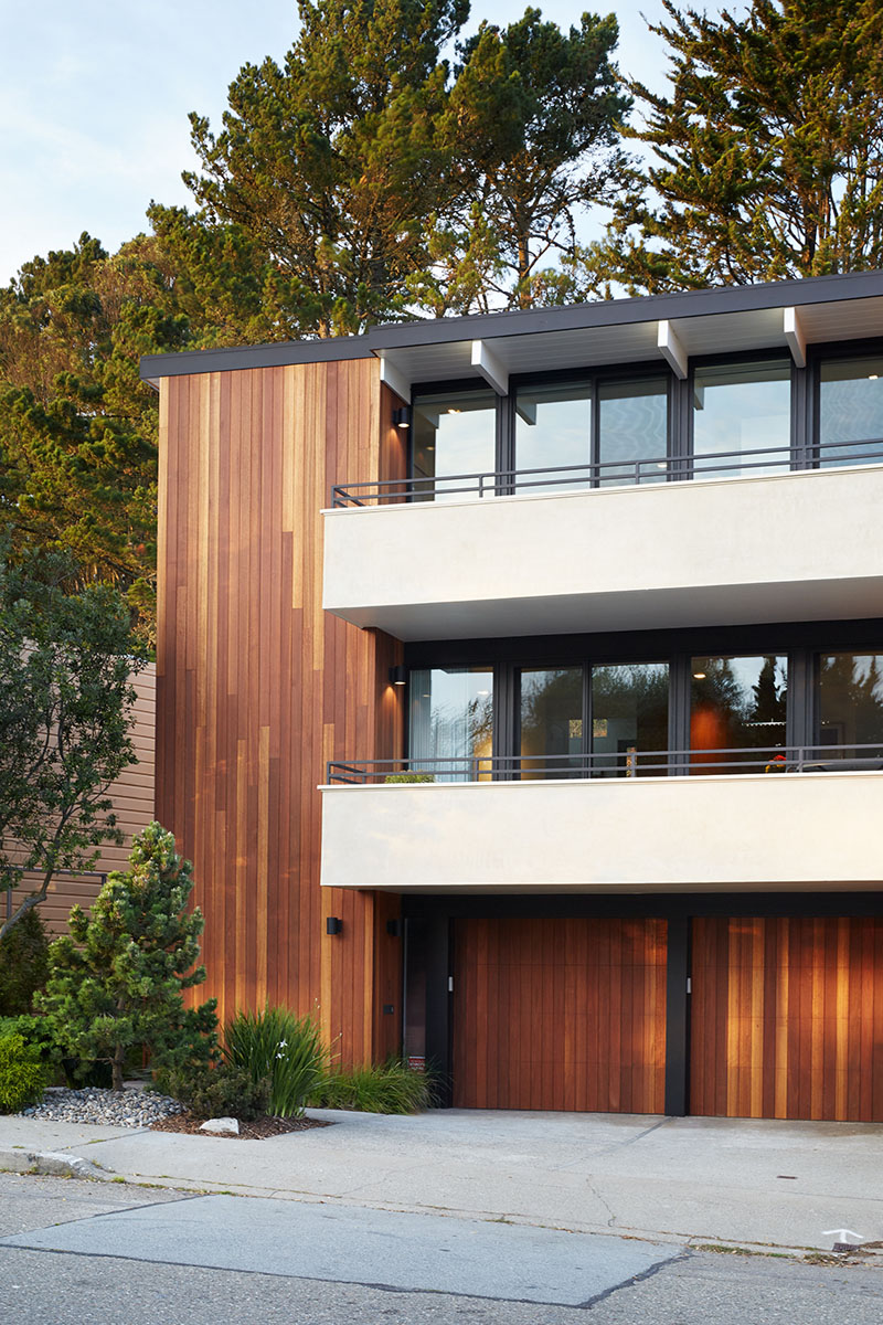 A modern home with bright, airy spaces that blend mid-century style and contemporary elegance, designed for seamless indoor-outdoor living.