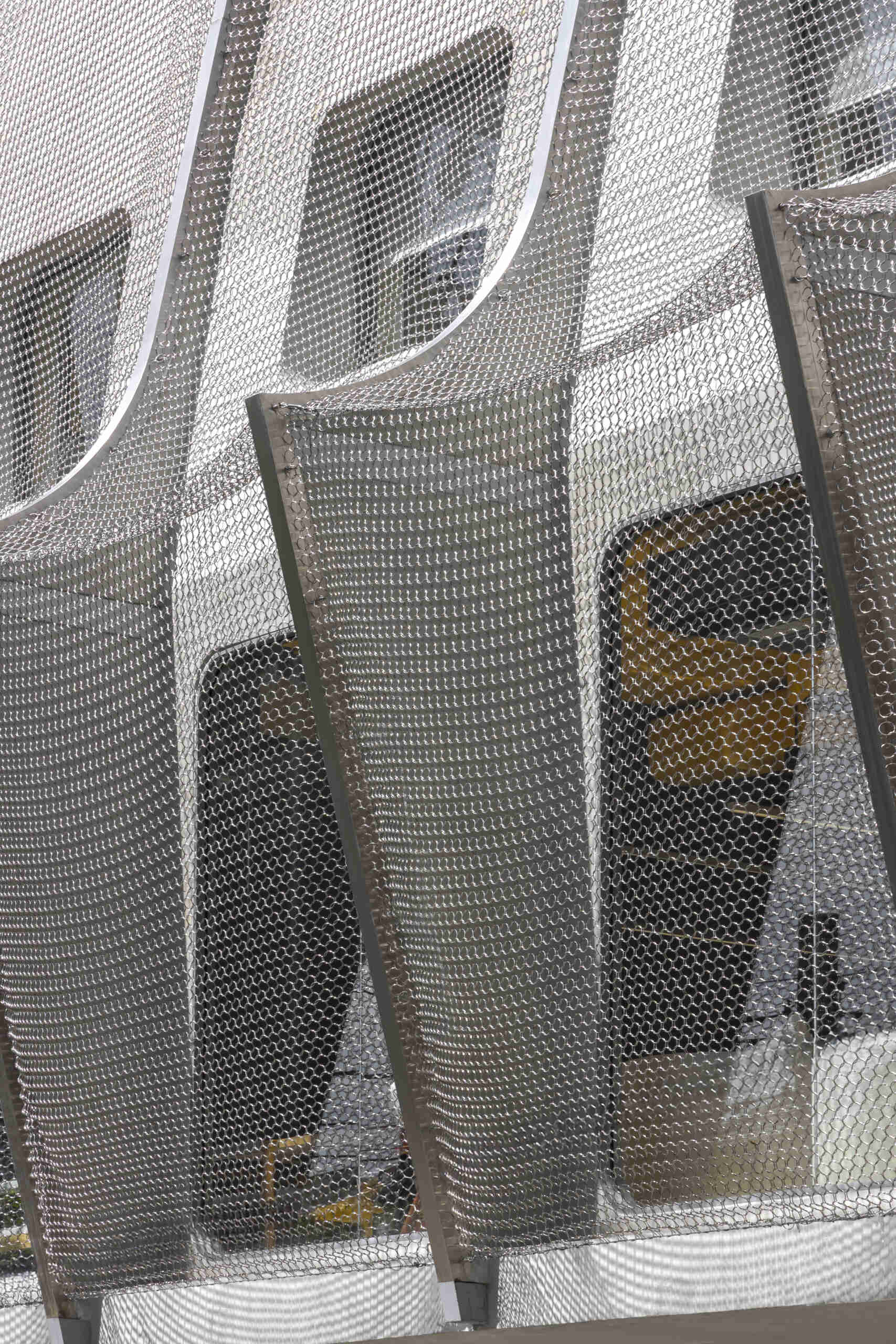 A fresh take on Thai architecture: this Bangkok hotel’s facade blends carved traditional Pun-Lom details with glimmering stainless steel chains, nodding to mosquito nets from the past.