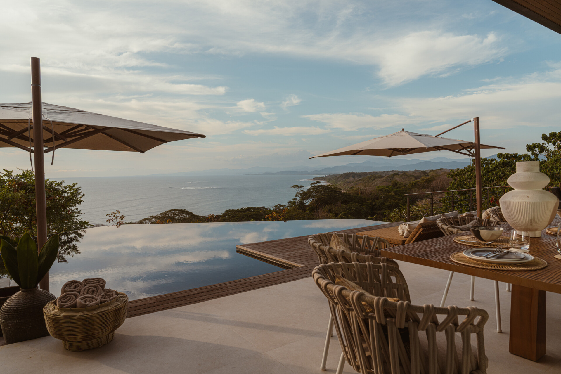 A stepped terrace leads to an infinity pool, designed for moonset watching, quiet reflection, and jungle immersion.