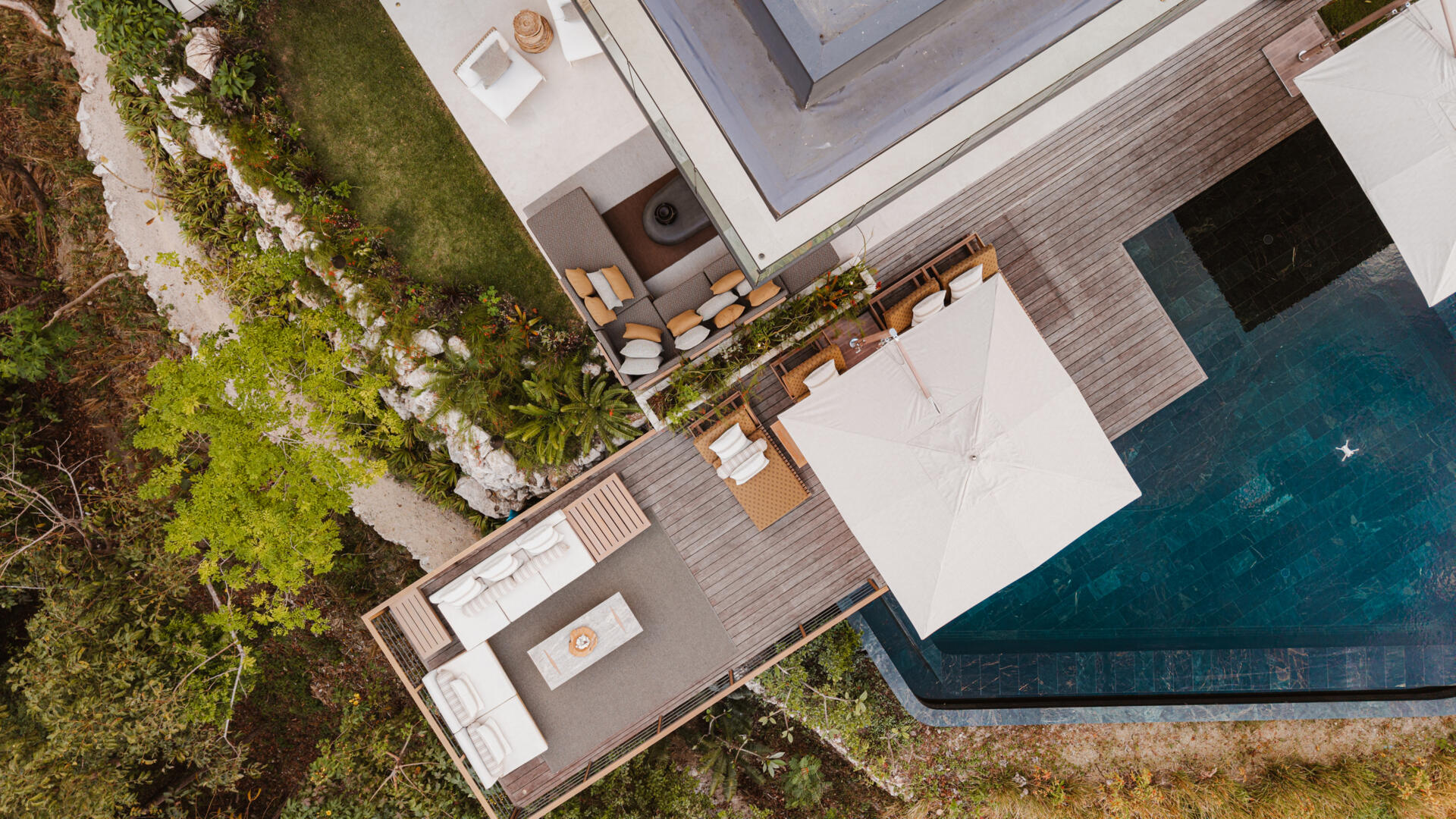 A stepped terrace leads to an infinity pool, designed for moonset watching, quiet reflection, and jungle immersion.
