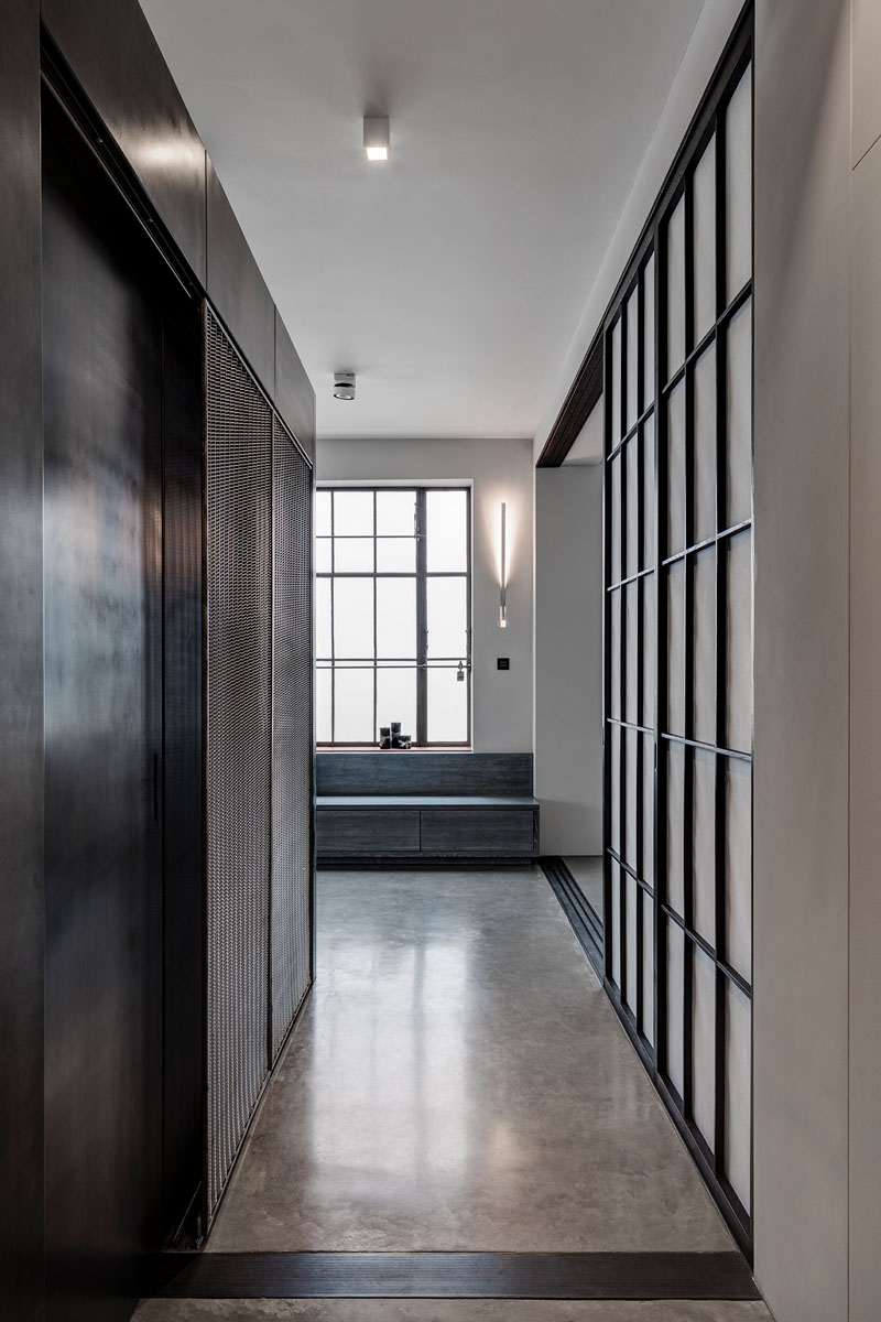 A 1930s shoe factory was converted into a contemporary apartment filled with industrial character and highly personal design details.