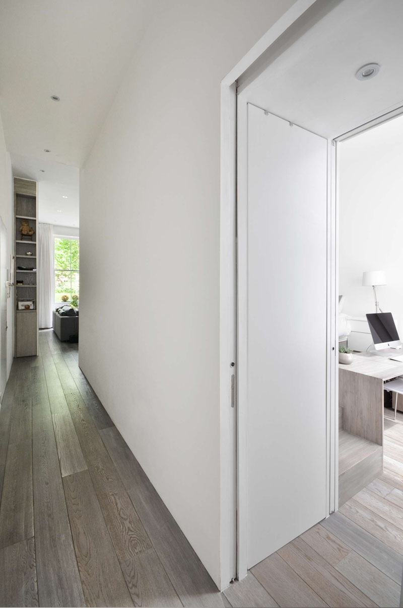 Custom cabinetry runs throughout this home, proving every inch can be both functional and beautiful.