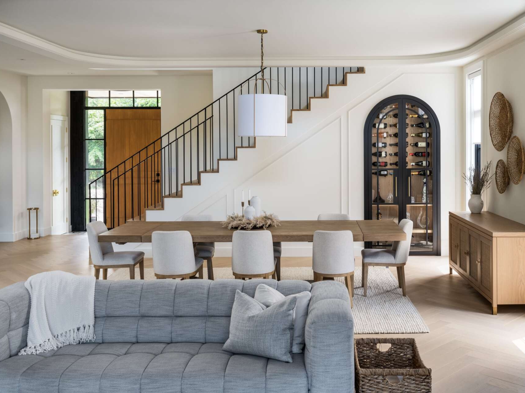 A modern family home inspired by Italian simplicity, natural materials, and the seamless connection of indoor and outdoor living.