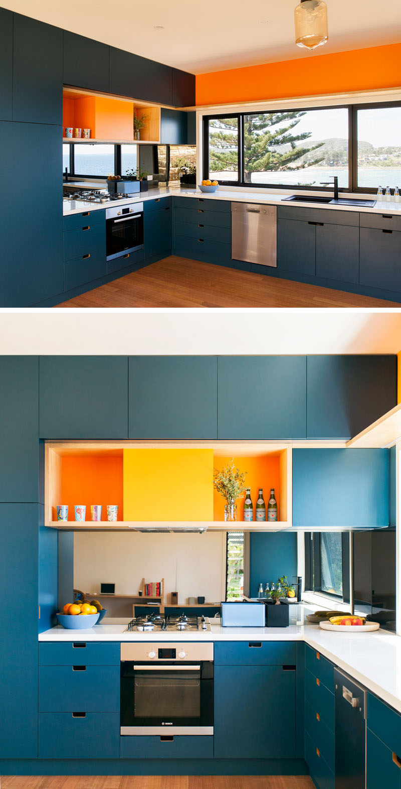 This kitchen makes a bold design statement in deep blue, balanced with bright white countertops and accented by lively pops of orange that add warmth and energy to the space.