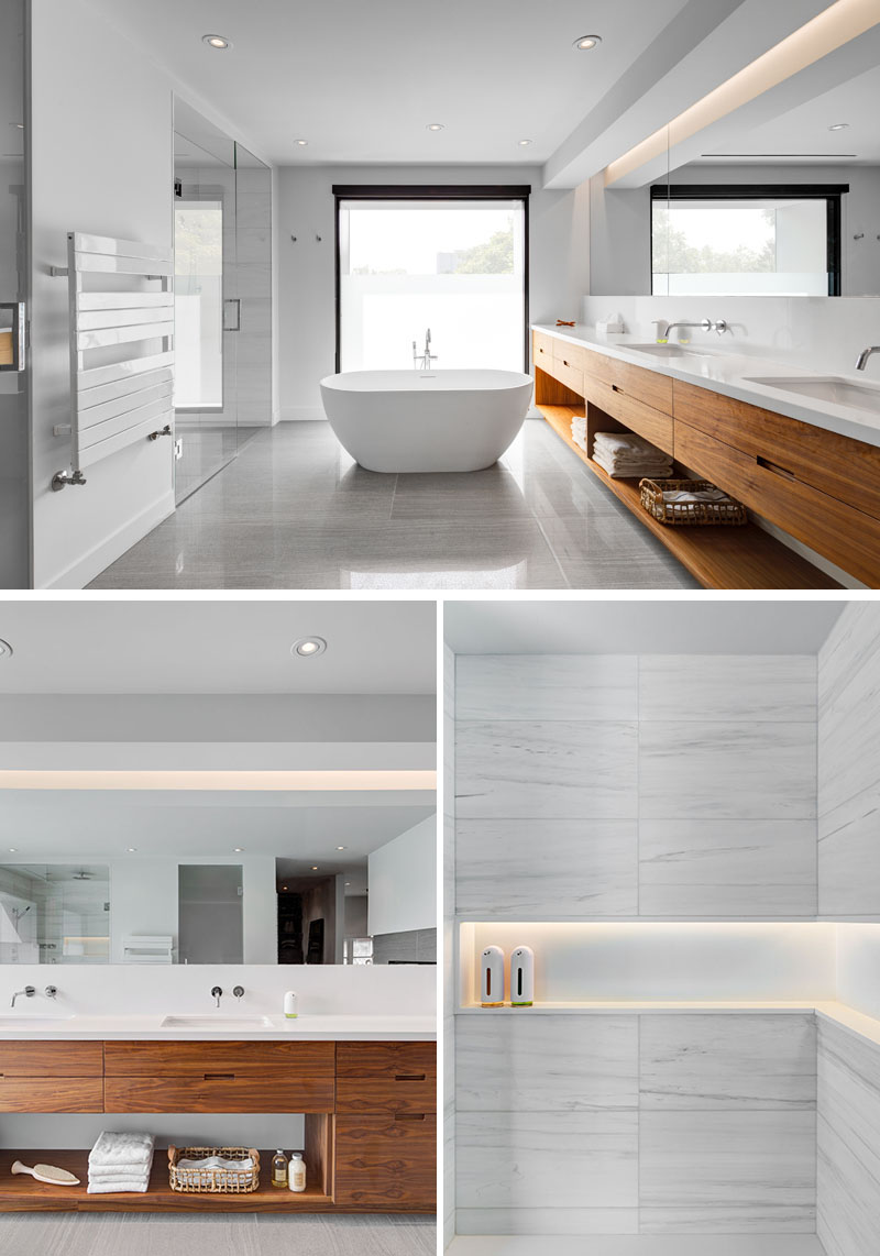 The bathroom’s standalone tub, walk-in shower, and full-length vanity create a spa-like space with modern elegance.