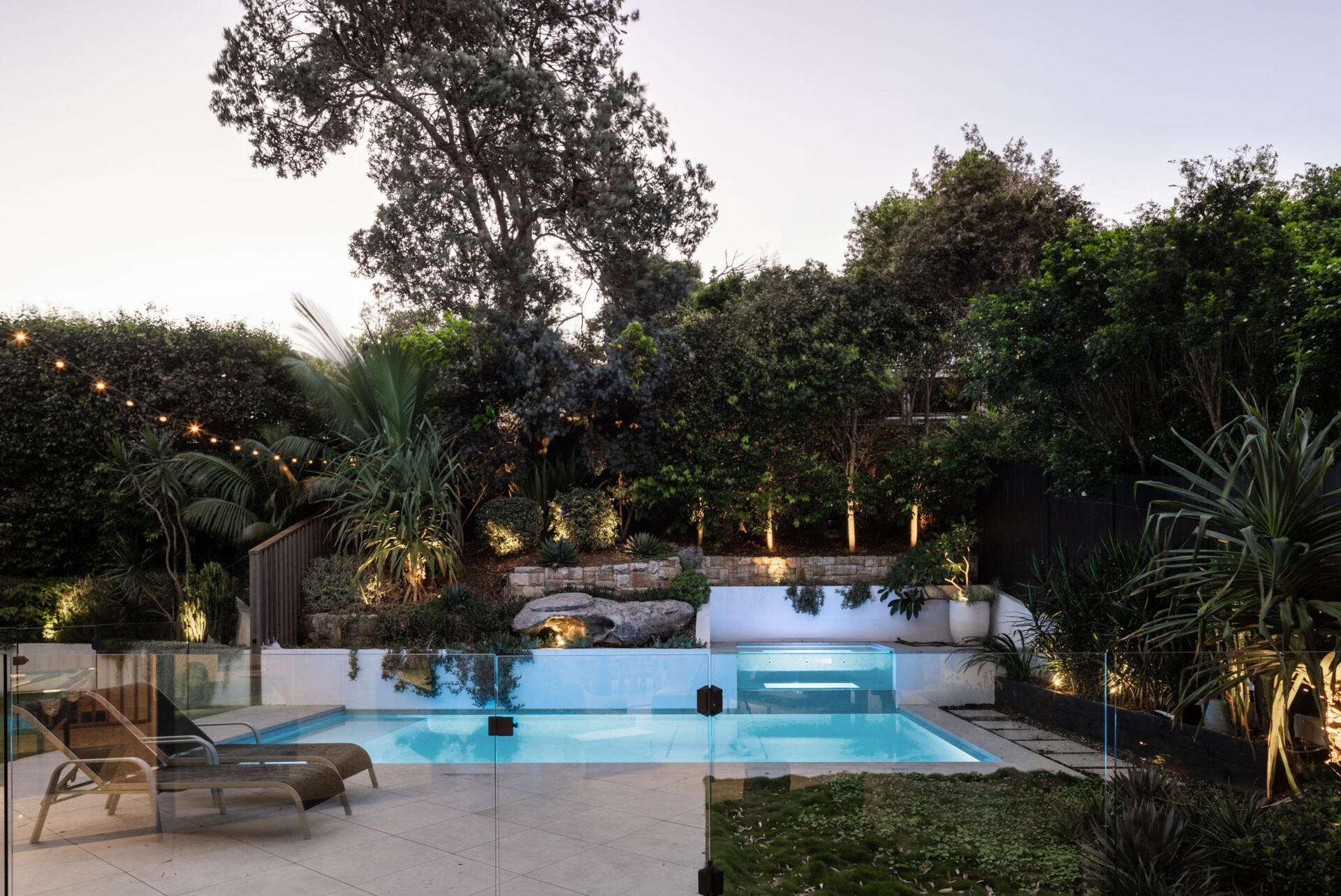 A modern swimming pool and terrace.