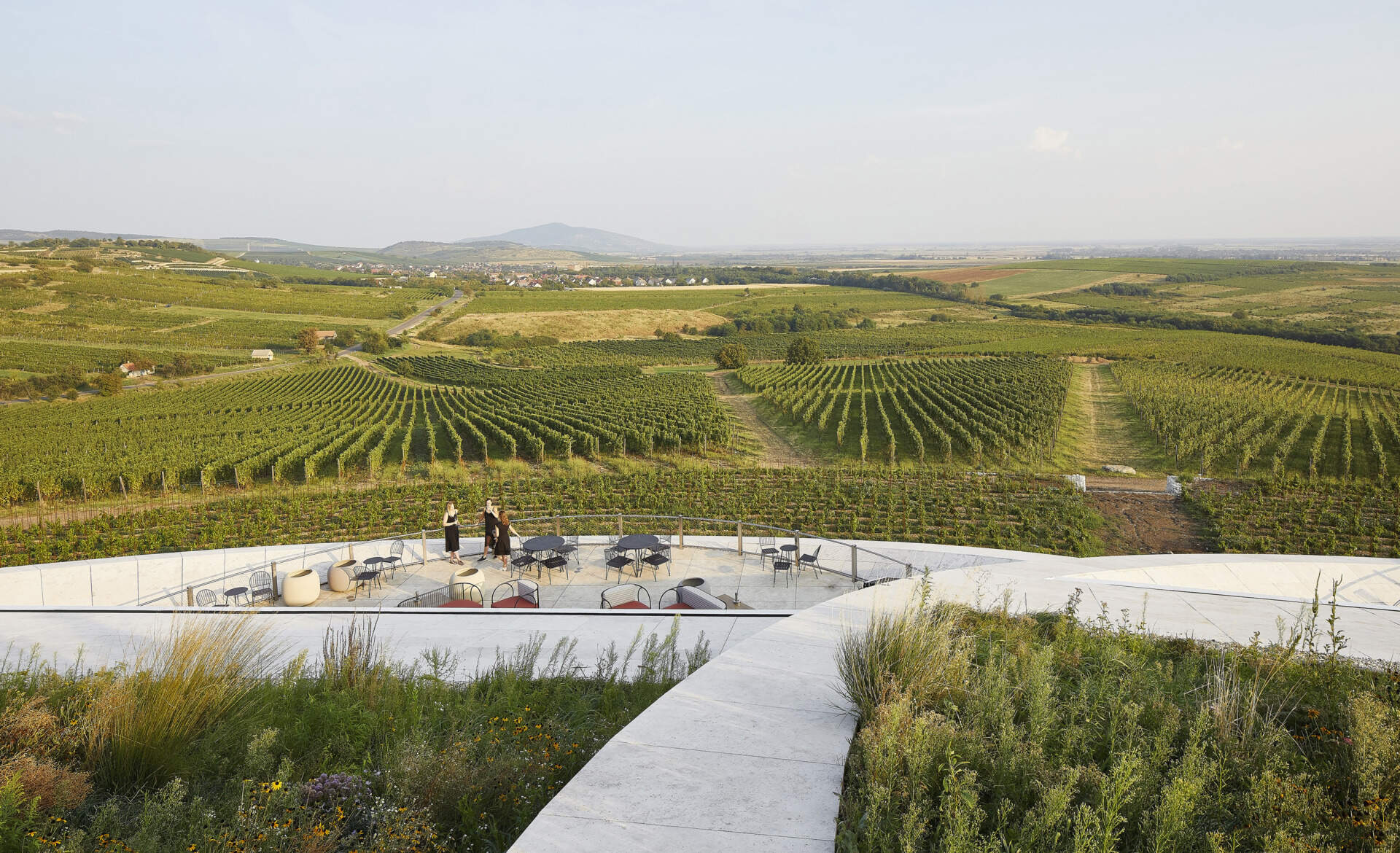 Step onto the panoramic terrace for breathtaking vineyard views, connecting visitors directly with the Tokaj landscape while enjoying a relaxed outdoor space.