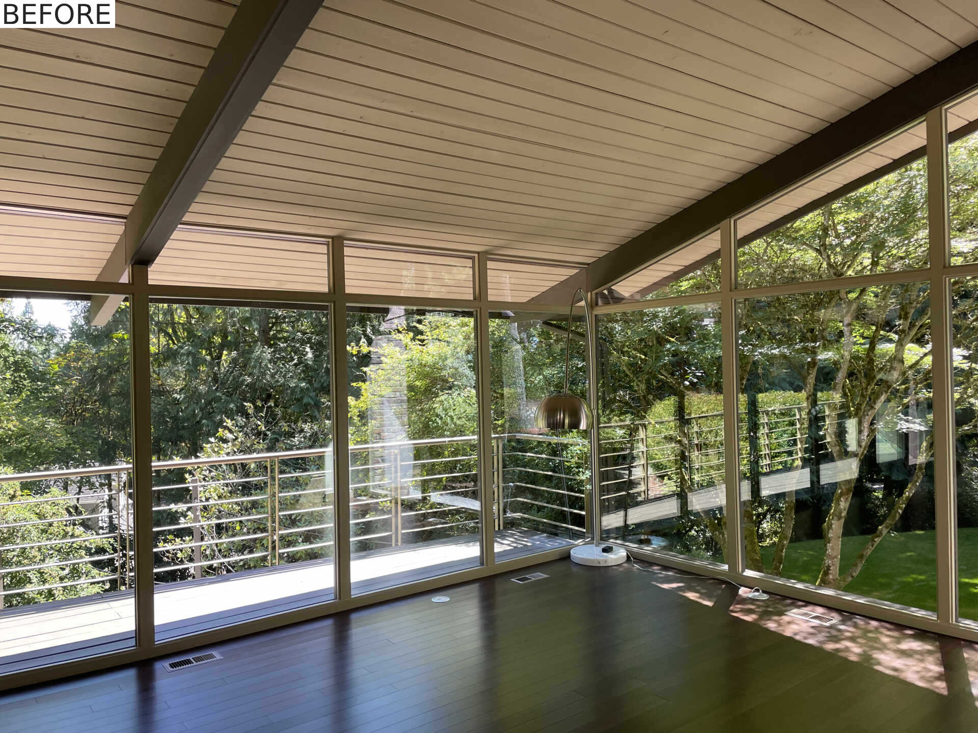 BEFORE - A mid-century modern living room before it received a renovation.