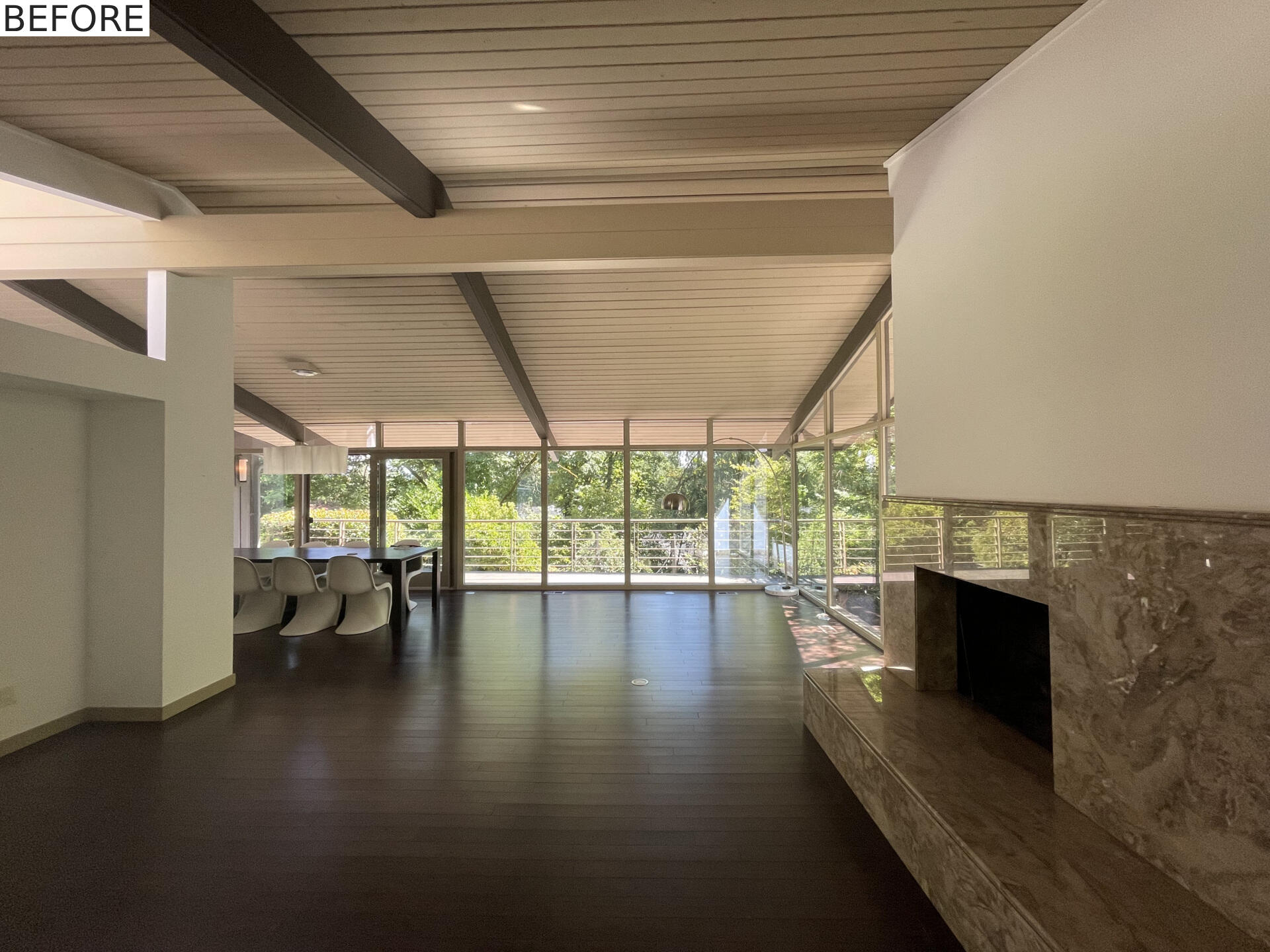 BEFORE - A mid-century modern living room before it received a renovation.