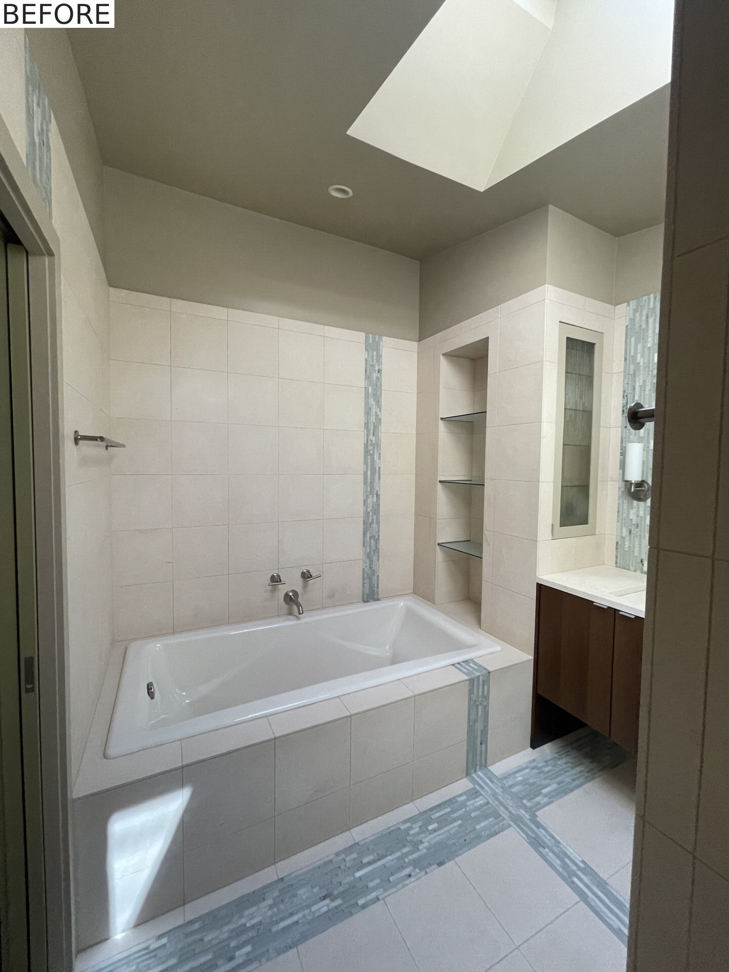 BEFORE - A bathroom before it received a modern renovation.
