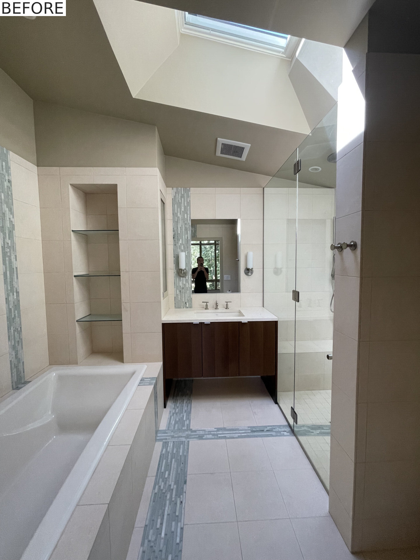 BEFORE - A bathroom before it received a modern renovation.
