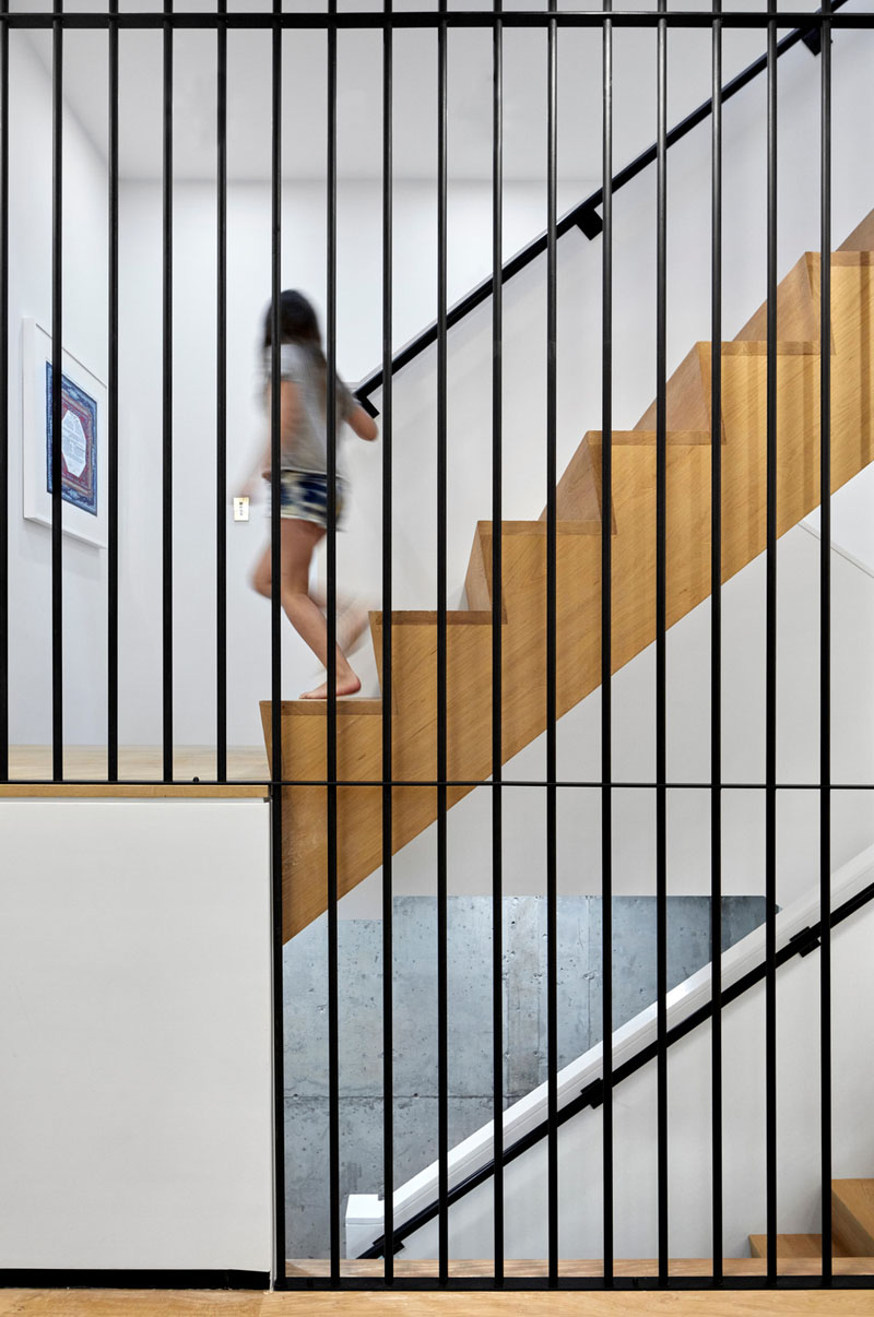 A central staircase connects all of the floors of this home.