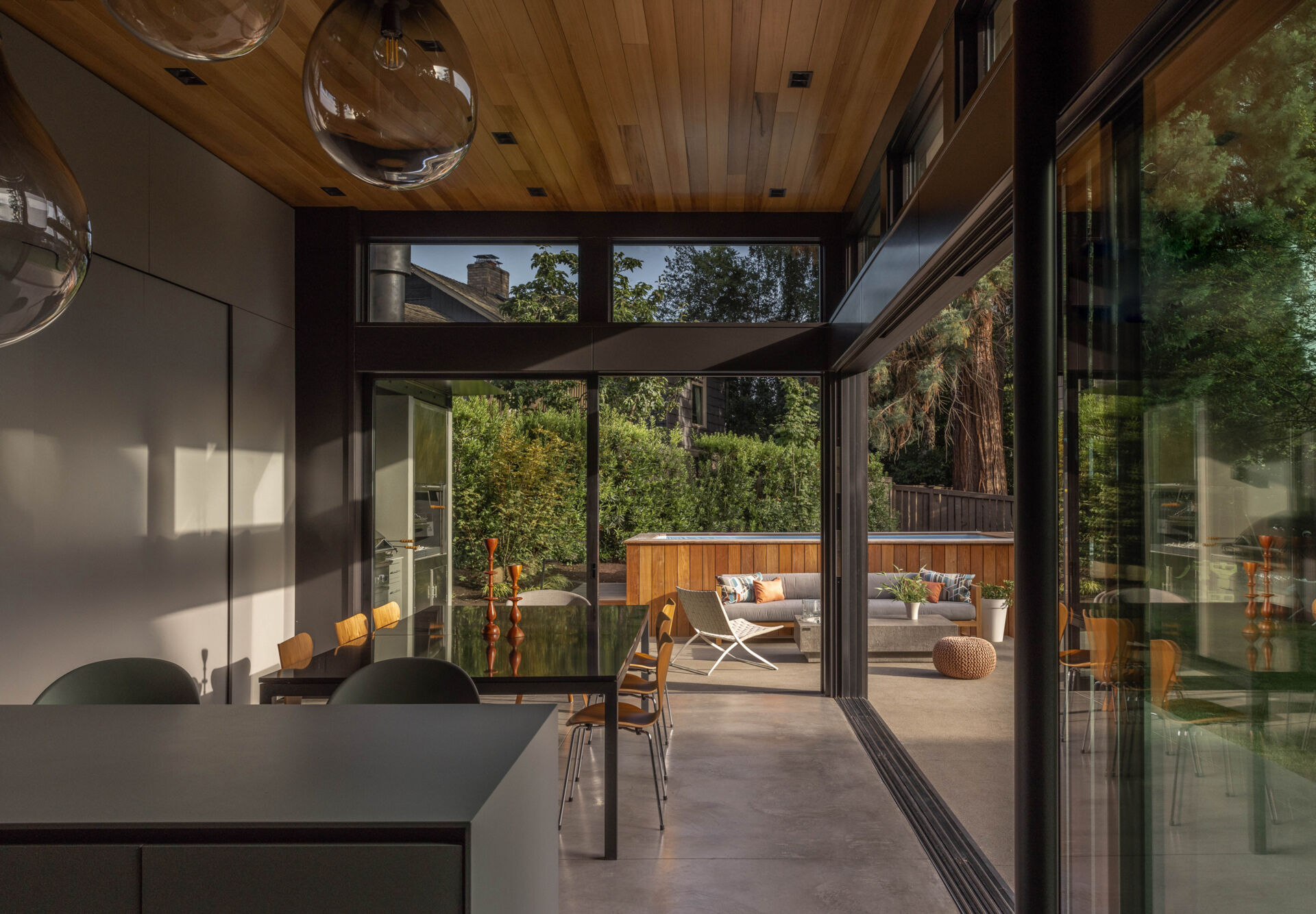 A welcoming dining area designed for shared meals, with easy flow between kitchen and outdoors, perfect for family gatherings and entertaining.
