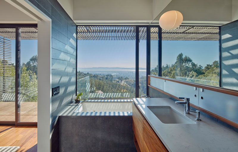 In this bathroom, the tub is carefully positioned to take in the sweeping views, turning daily rituals into moments of connection with the surrounding landscape.