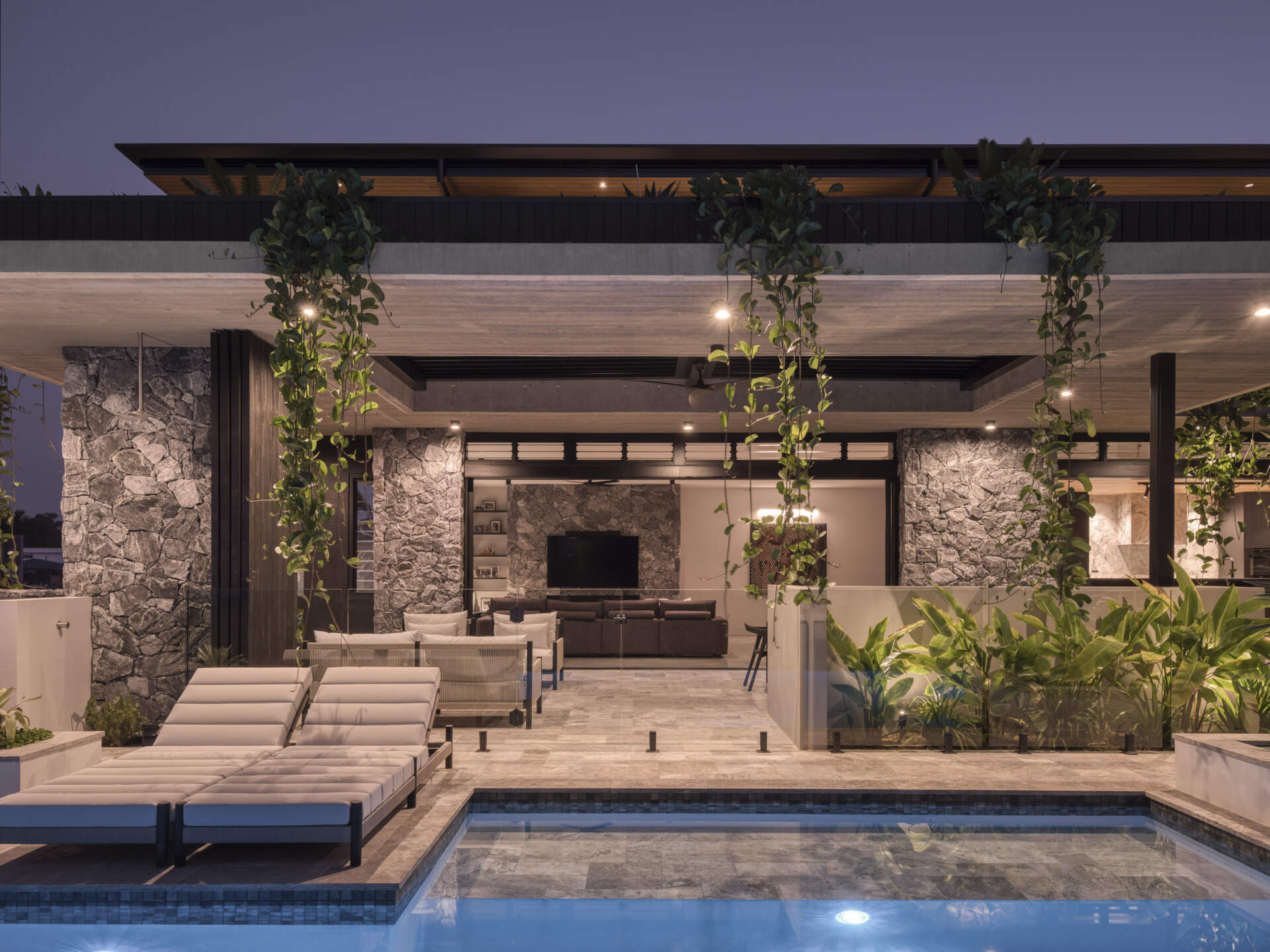 The pool area is integrated with layered planting and courtyard zones, blending recreation with the landscape. It offers both privacy and visual connection to the central garden, reinforcing the home’s seamless flow between built form and nature.