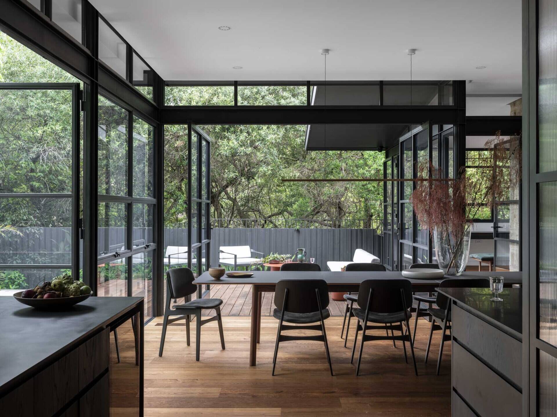 The dining space was one of the few areas expanded in volume and height. This small but significant alteration filled the room with daylight and created a central point for gathering. With its new proportions, the dining room became not just functional but celebratory, capturing the essence of communal living.