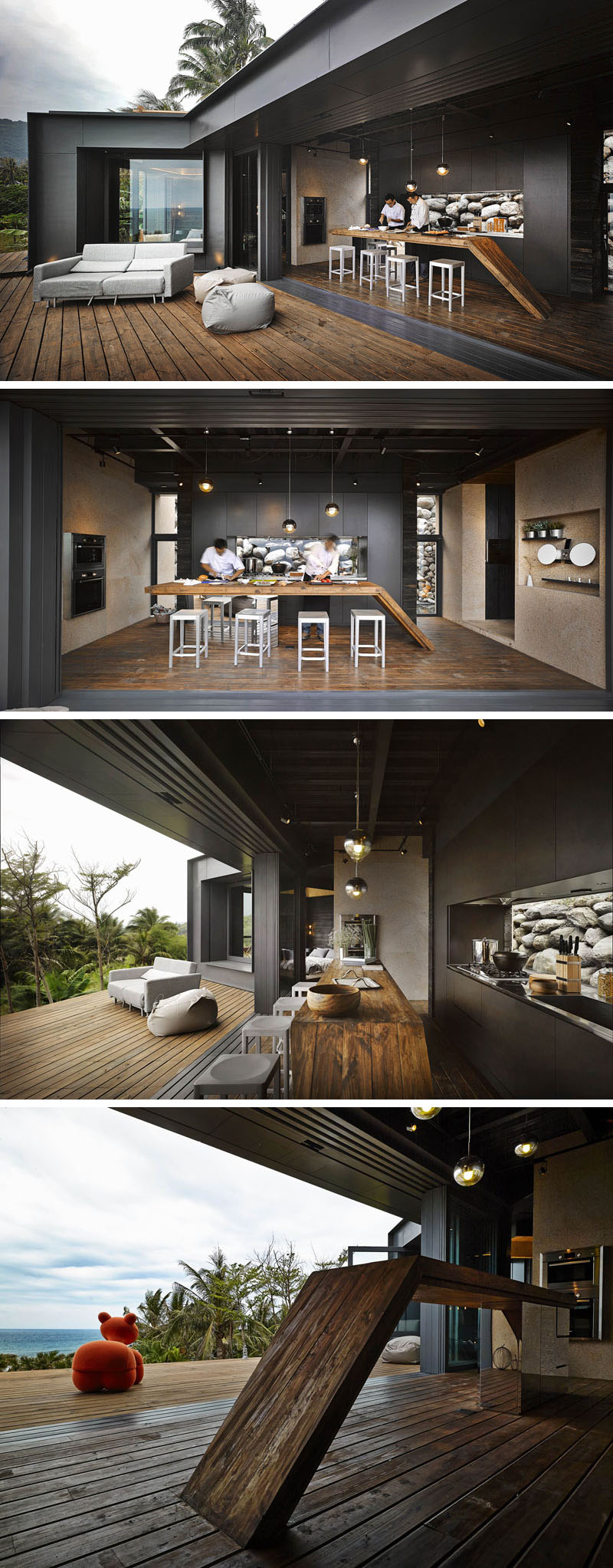 This modern black kitchen blends steel, wood, and glass, opening seamlessly to the outdoor deck for indoor–outdoor living.