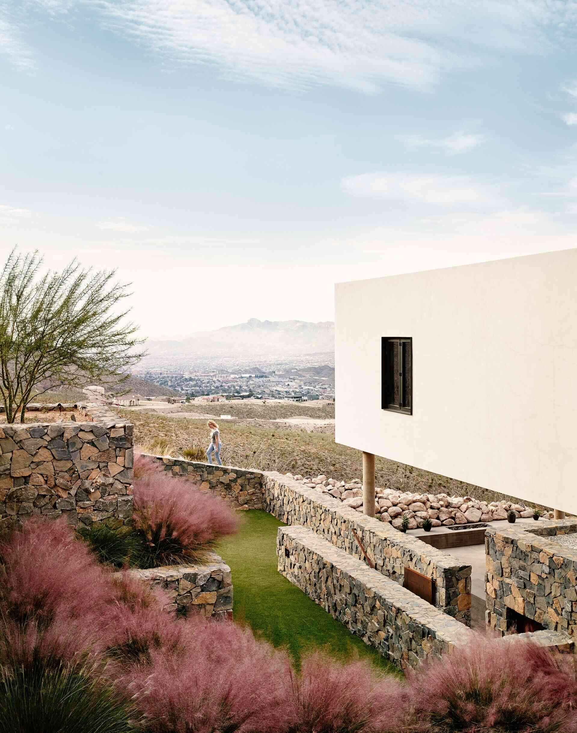 Hillside residence where every level opens to the Franklin Mountain landscape, defining a true modern mountain home.