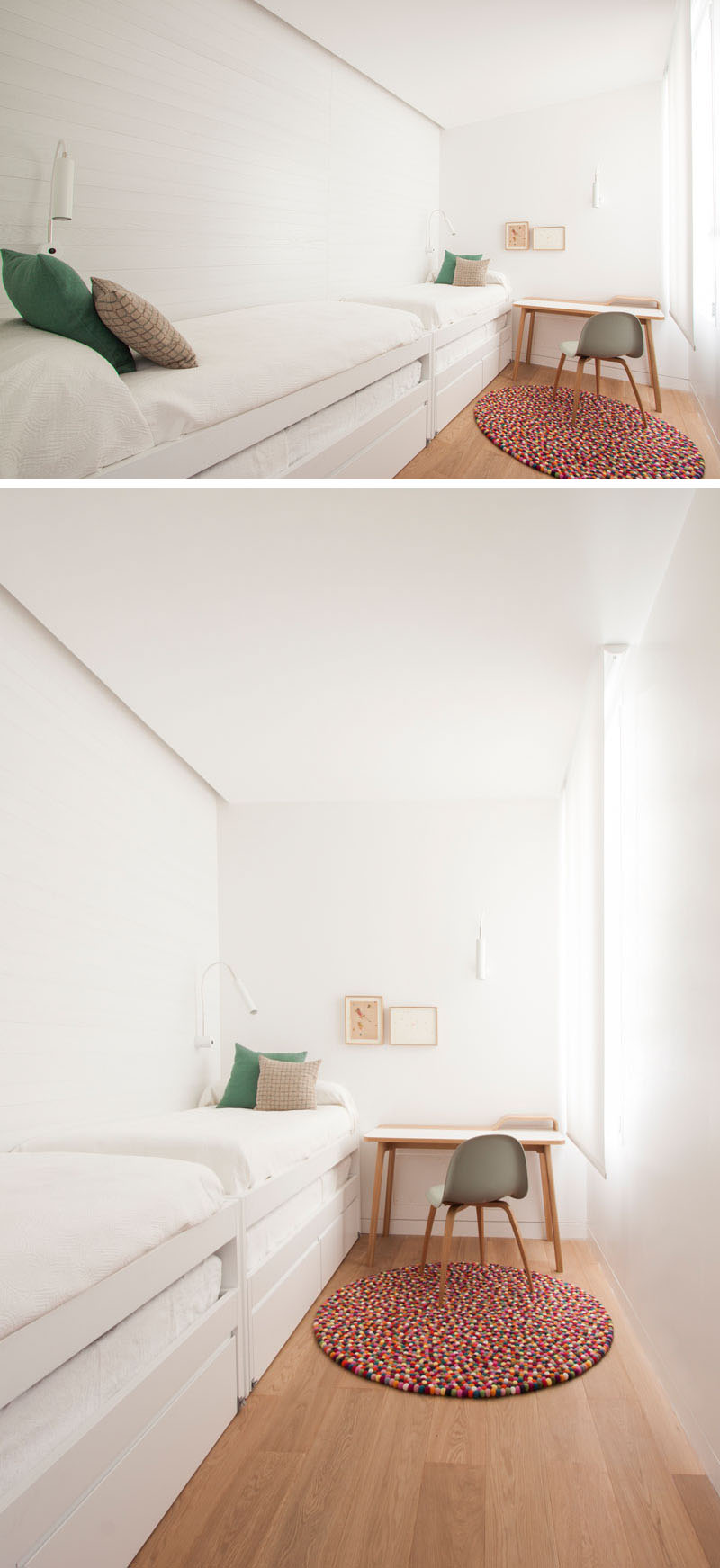 A narrow bedroom accommodates two beds along a white wood slat wall, each with a trundle for guests. A small desk by the window adds functionality without cluttering the space.