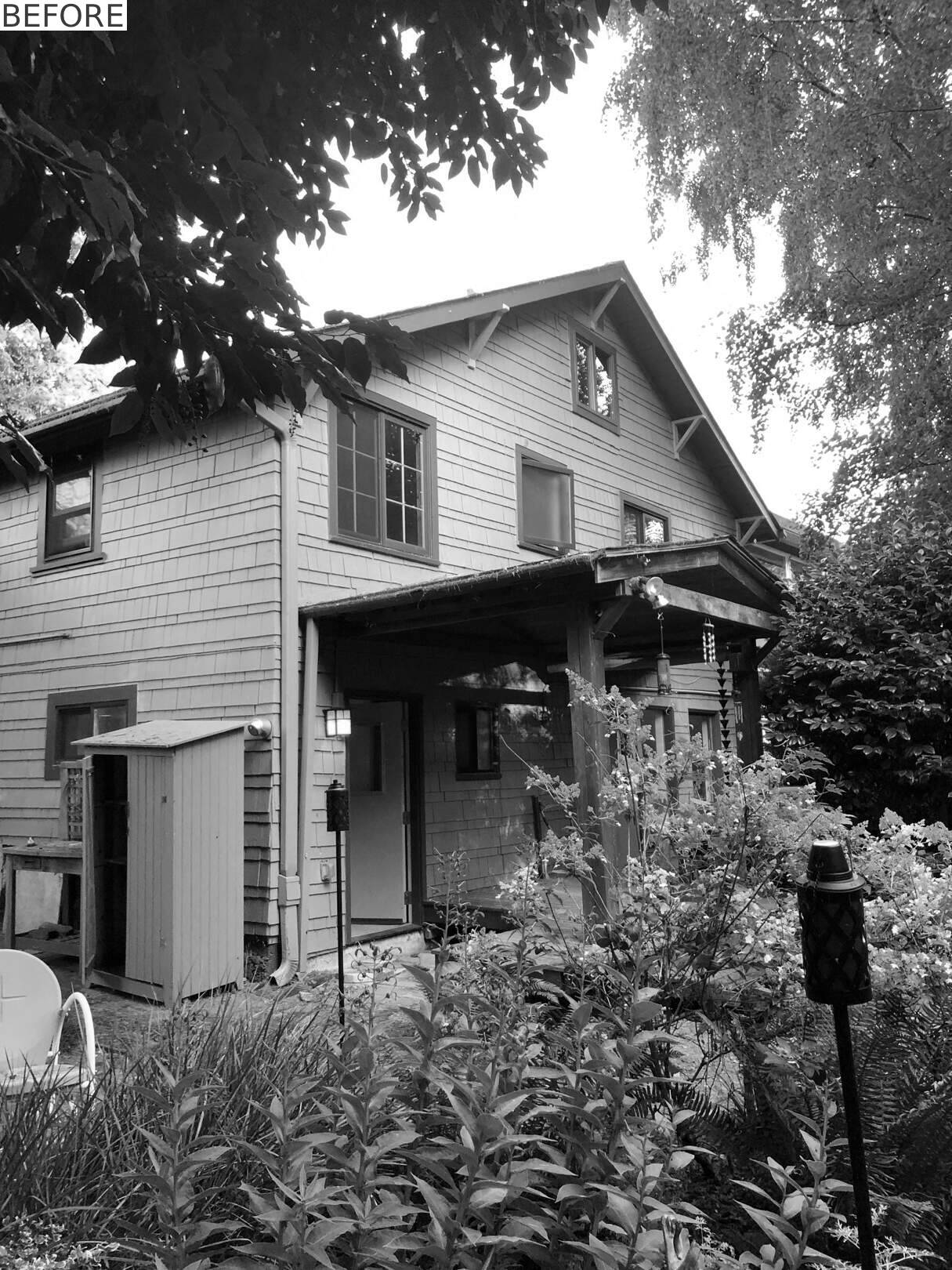 BEFORE - See how a bright teal addition transformed the street view of this 1919 Seattle home while preserving its historic layers.