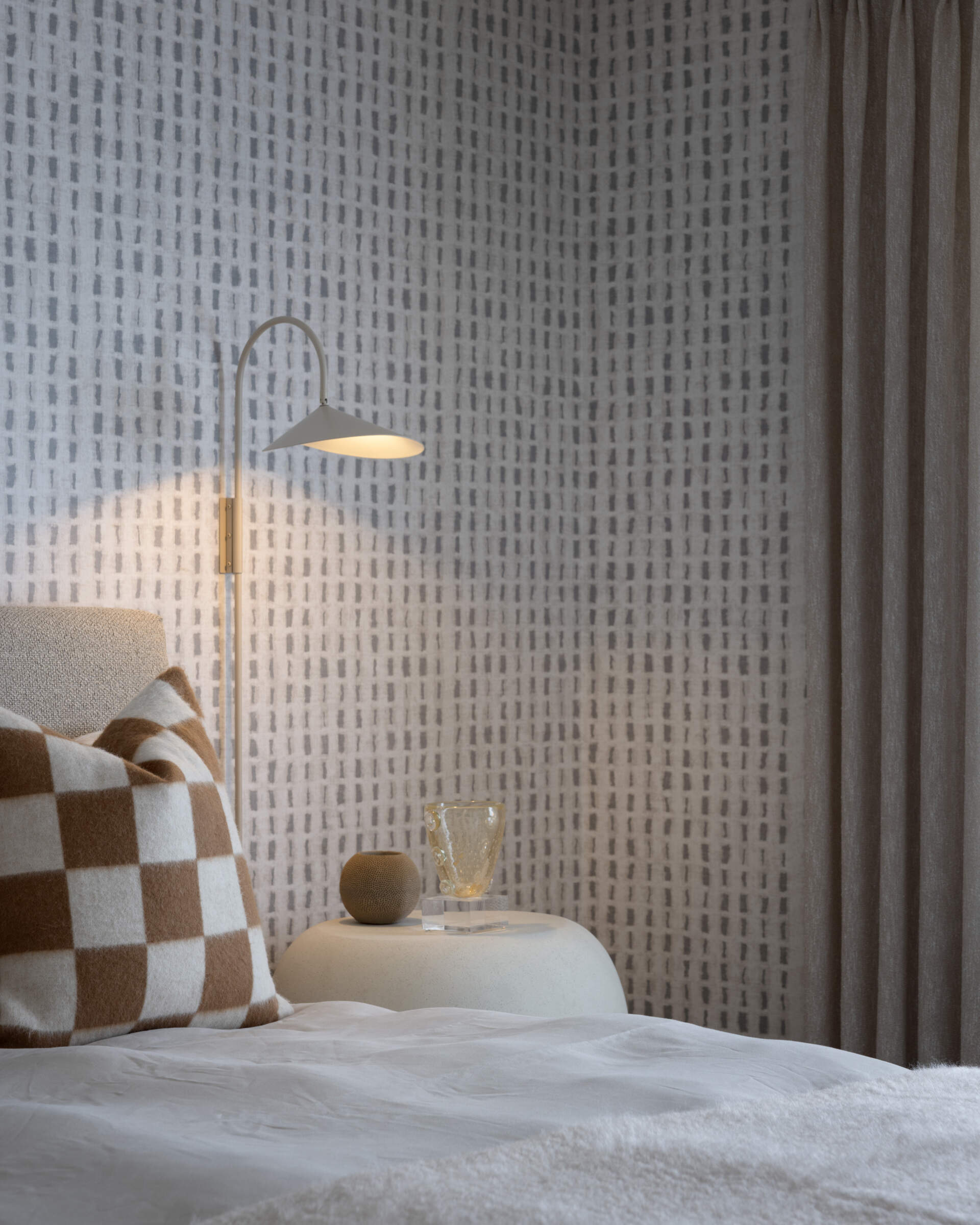Contemporary bedroom design with wallpaper.
