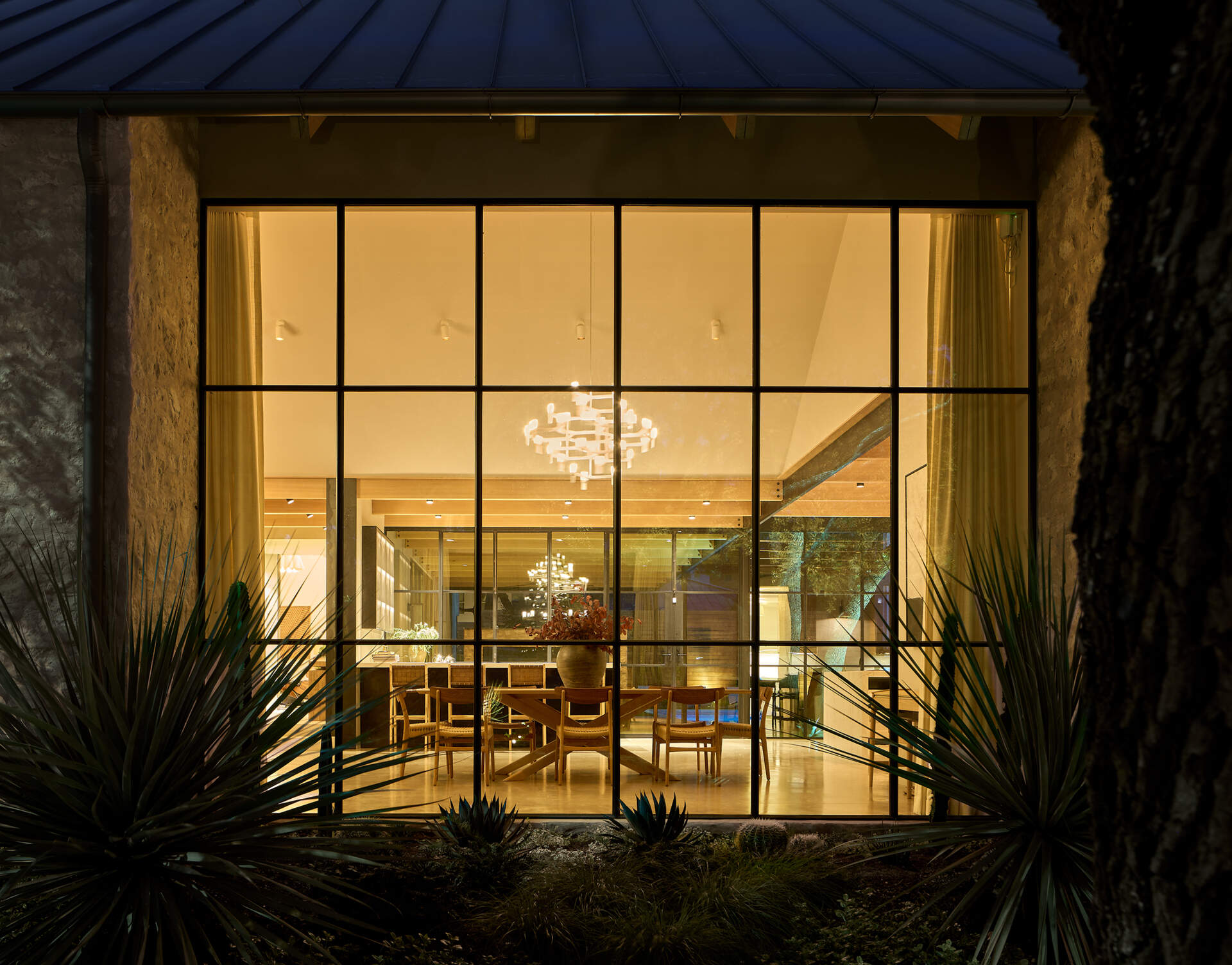 A modern home with black-framed windows.