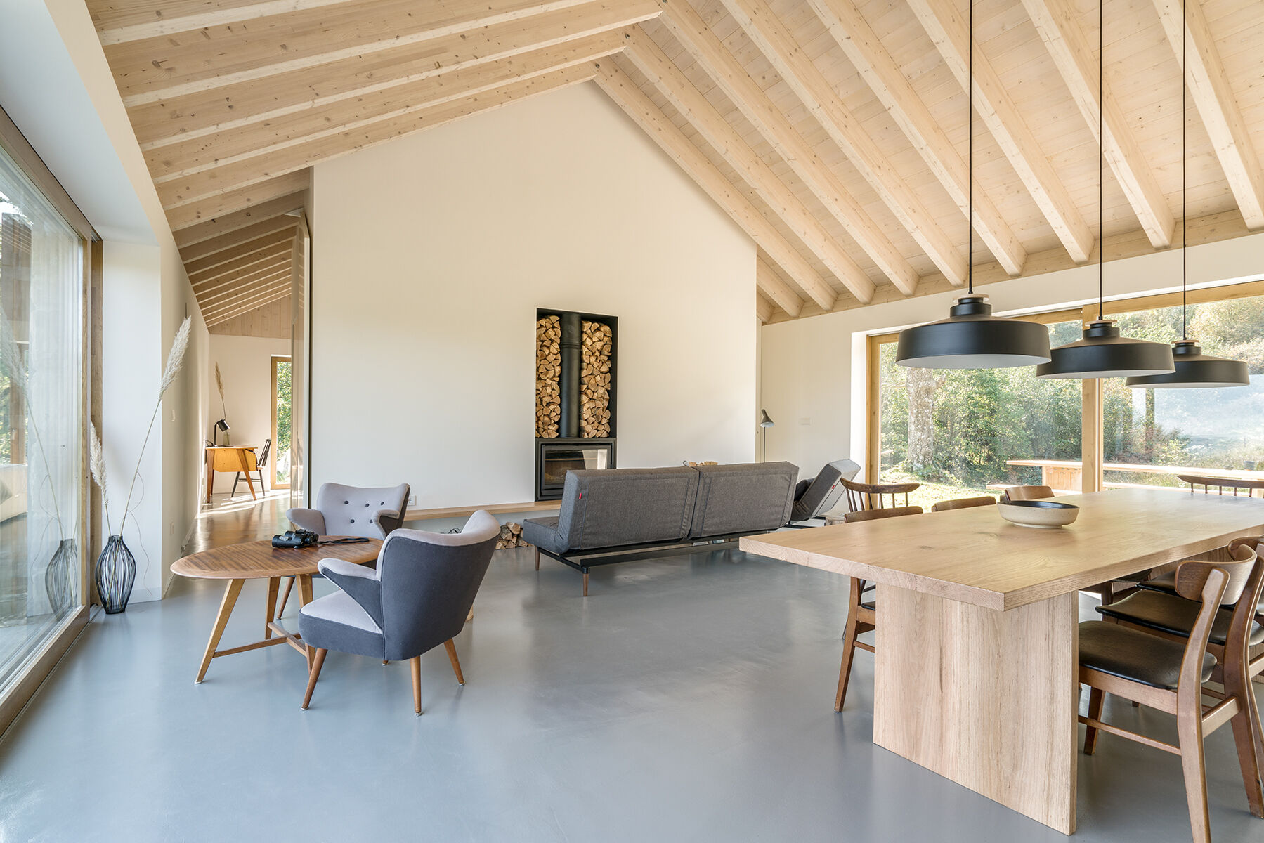 Warm wood, a fireplace, and minimalist decor make Villa Slow a place made for quiet moments.
