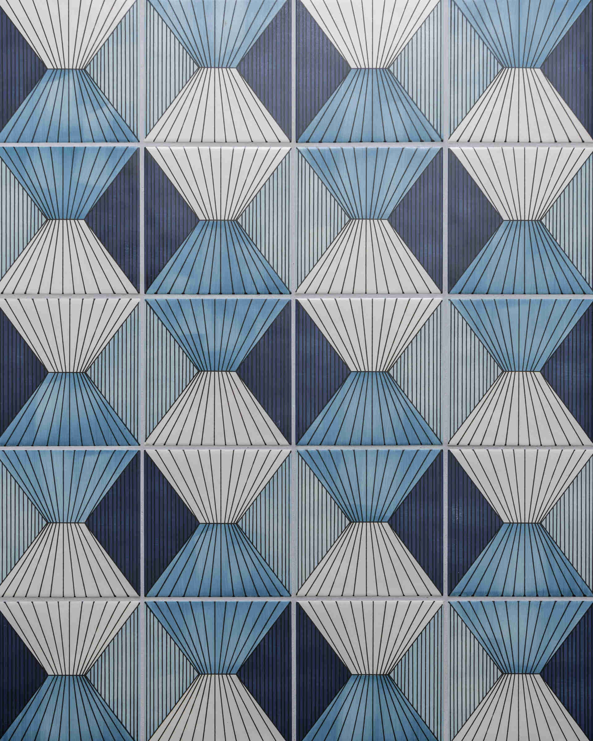 Patterned tile brings a cheerful kick to the laundry. Built-ins keep mess contained in the mudroom. Benches, hooks, and closed storage make coming and going painless. It is the kind of practical luxury that makes a house feel tailored.