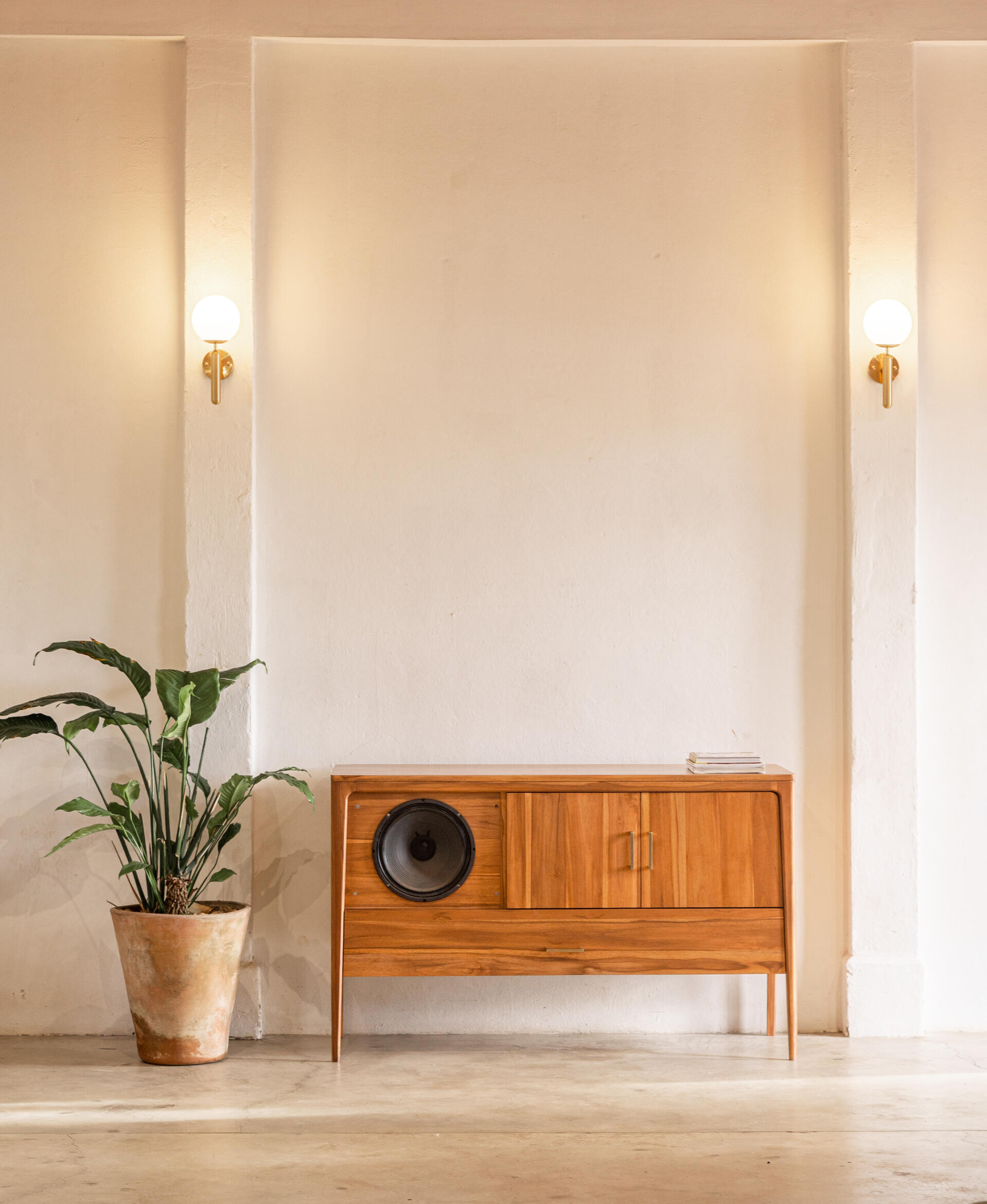 Sonoforma turns guitar amps into sculptural furniture you’ll actually want in your living room. Designed by Mike Nopper, these solid teak pieces merge mid-century warmth with studio-quality sound, proving that high performance and good design can share the same space.
