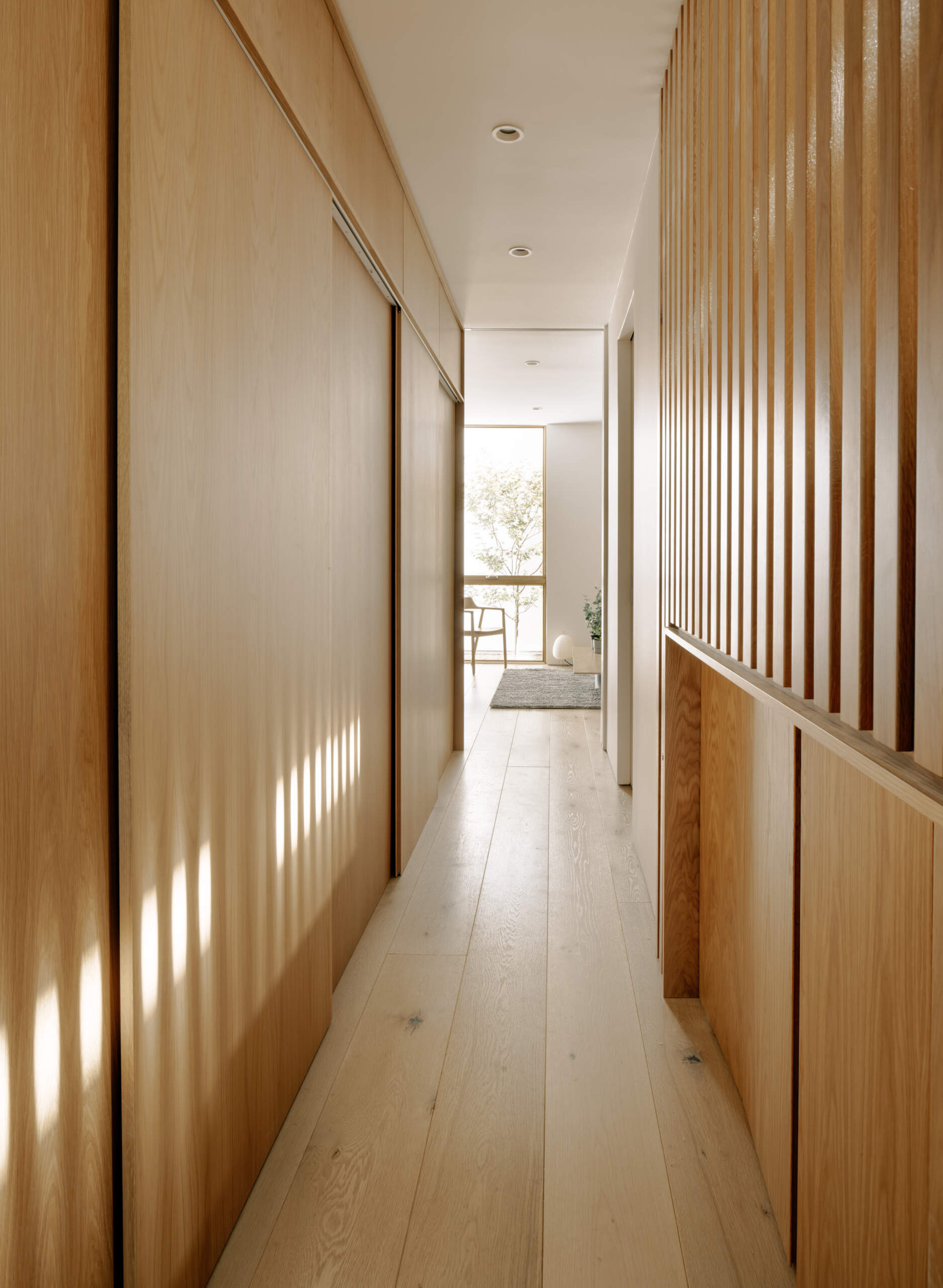 Strategically located along circulation paths, the hidden laundry supports daily routines without disrupting the flow of the home. Its discreet placement demonstrates thoughtful planning for functional, flexible family living.