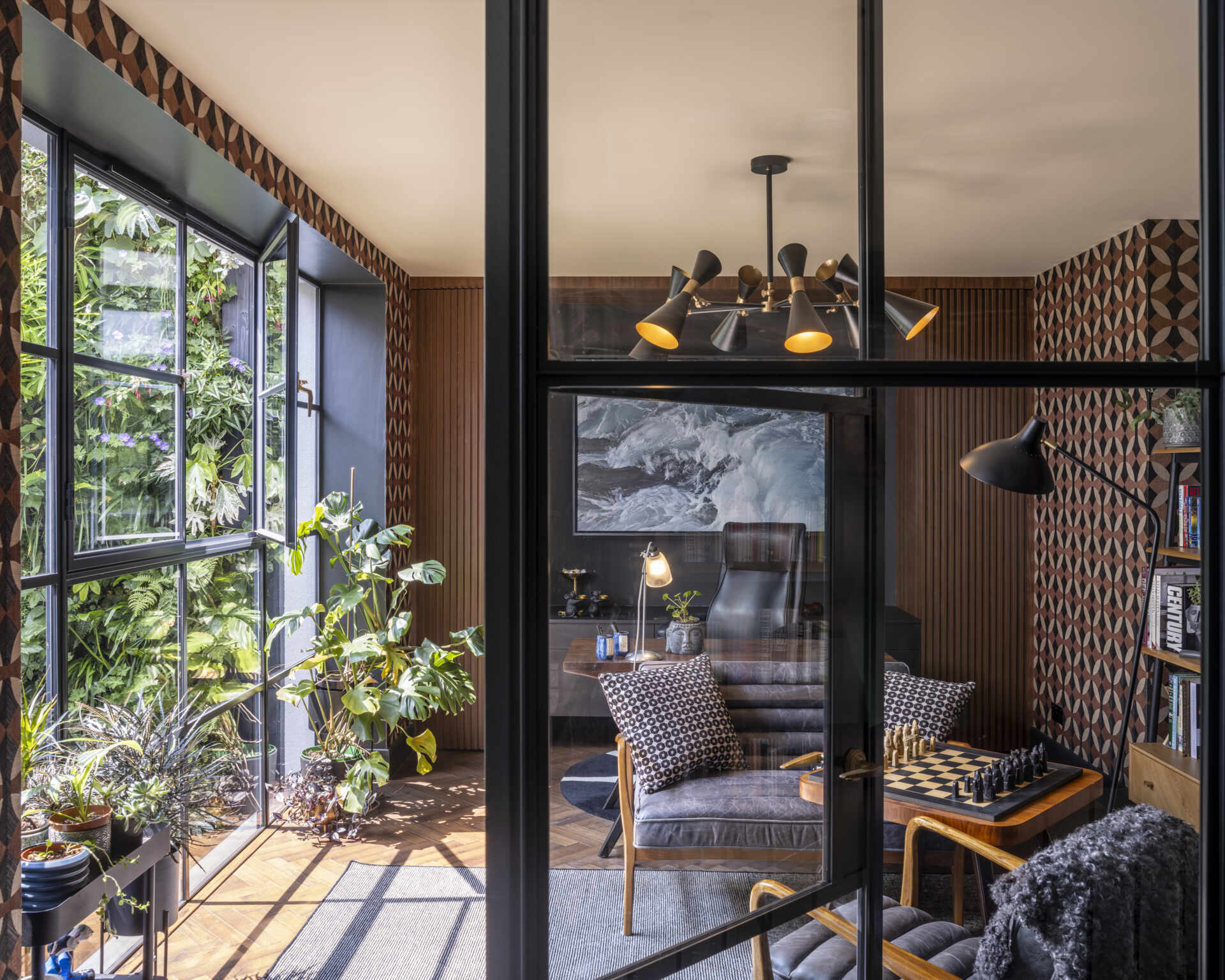 The home office overlooks the courtyard, designed as a serene and inspiring space for focused work.