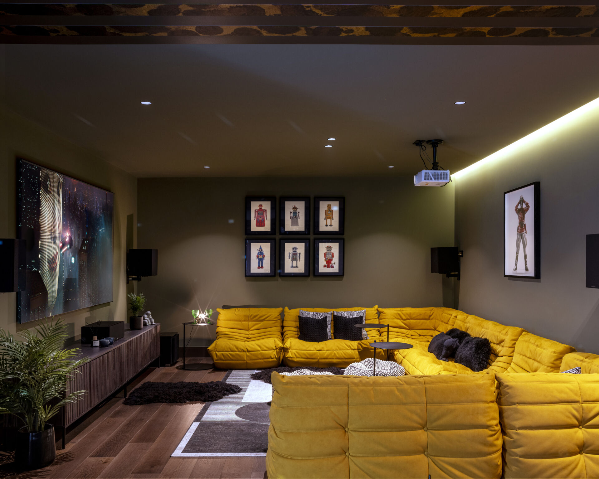 In the basement, the media and music rooms form part of a vibrant, multi-functional space. Designed for movies, gatherings, and creativity, this level demonstrates how practicality and personality can coexist.