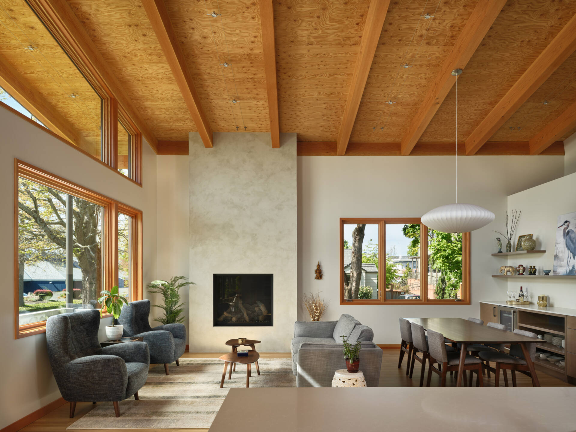 The ADU features an open living and dining area that maximizes the smaller footprint while remaining comfortable and inviting. Designed for functionality, these spaces accommodate both everyday life and visits from family. Large windows bring in natural light, giving the rooms a bright, airy feel, and the clean, modern lines maintain harmony with the home’s historic charm.