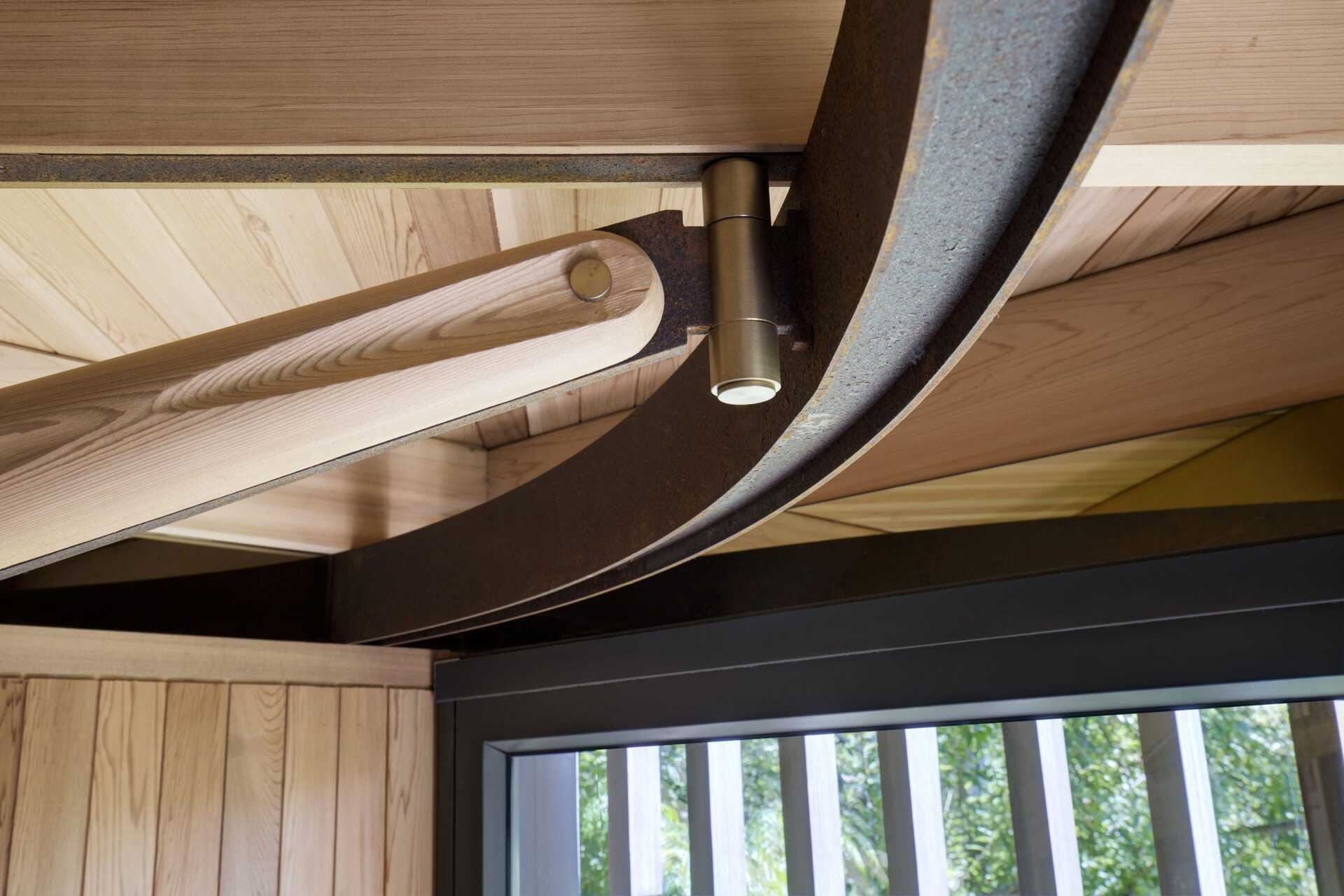 A pin-wheel layout of squares and circles creates harmony between architecture and nature.