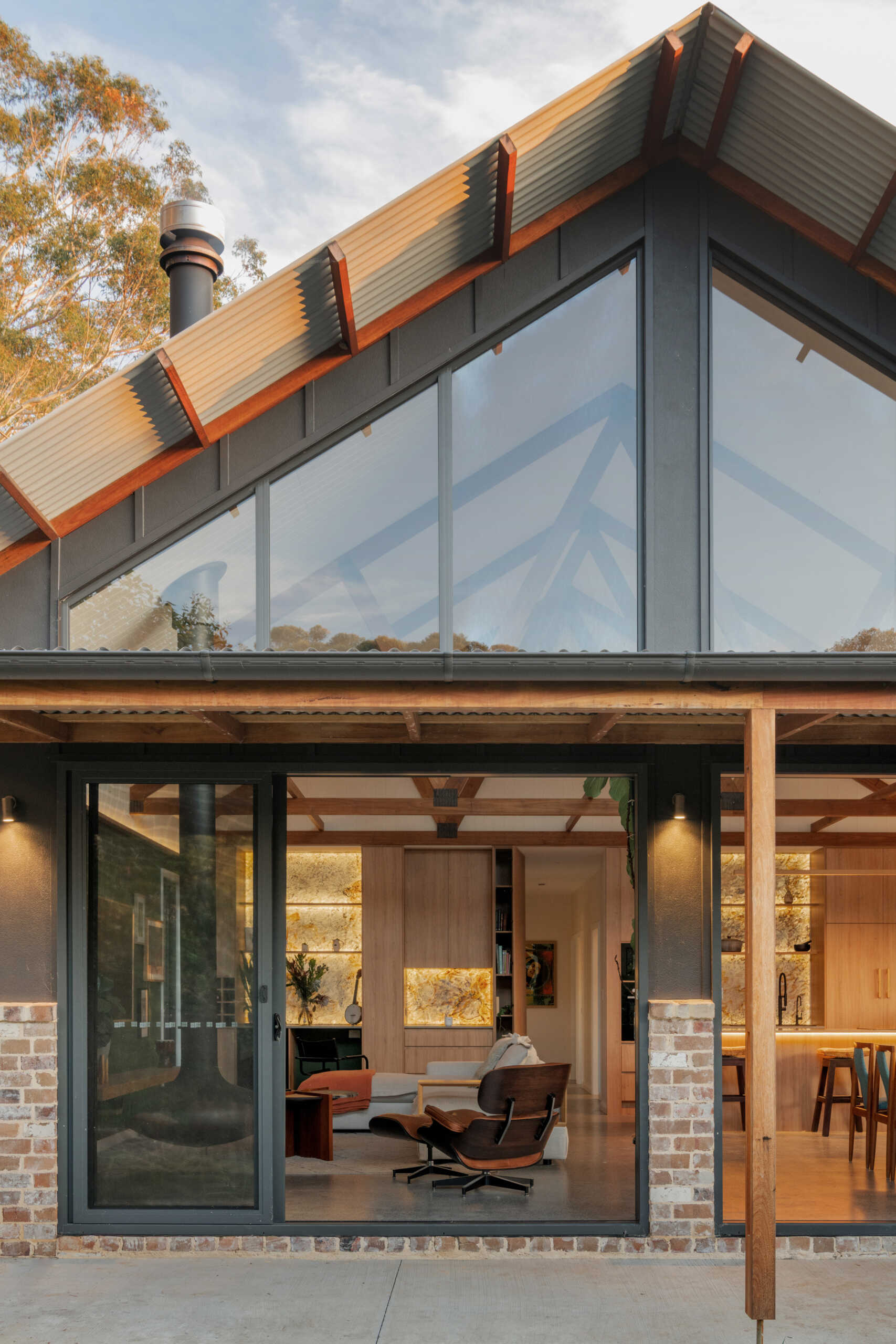 Leporte Residence reimagines the Australian farmhouse for a coastal setting. Designed by Lyric Architects, its gabled form, hardwood cladding, and refined detailing blend nostalgia with innovation, creating a home that feels timeless yet distinctly modern.