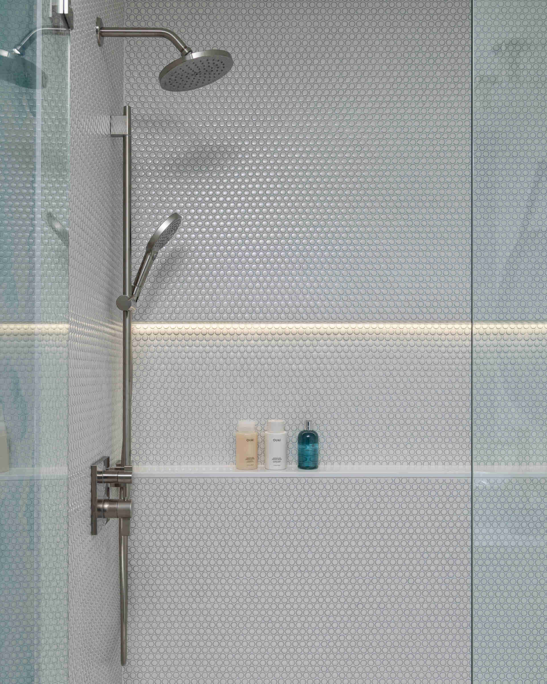 Guest and family baths repeat the language. Sleek fixtures, softly veined surfaces, great light. Everything in its place, nothing fighting for attention. The result is spa-level calm on every floor.